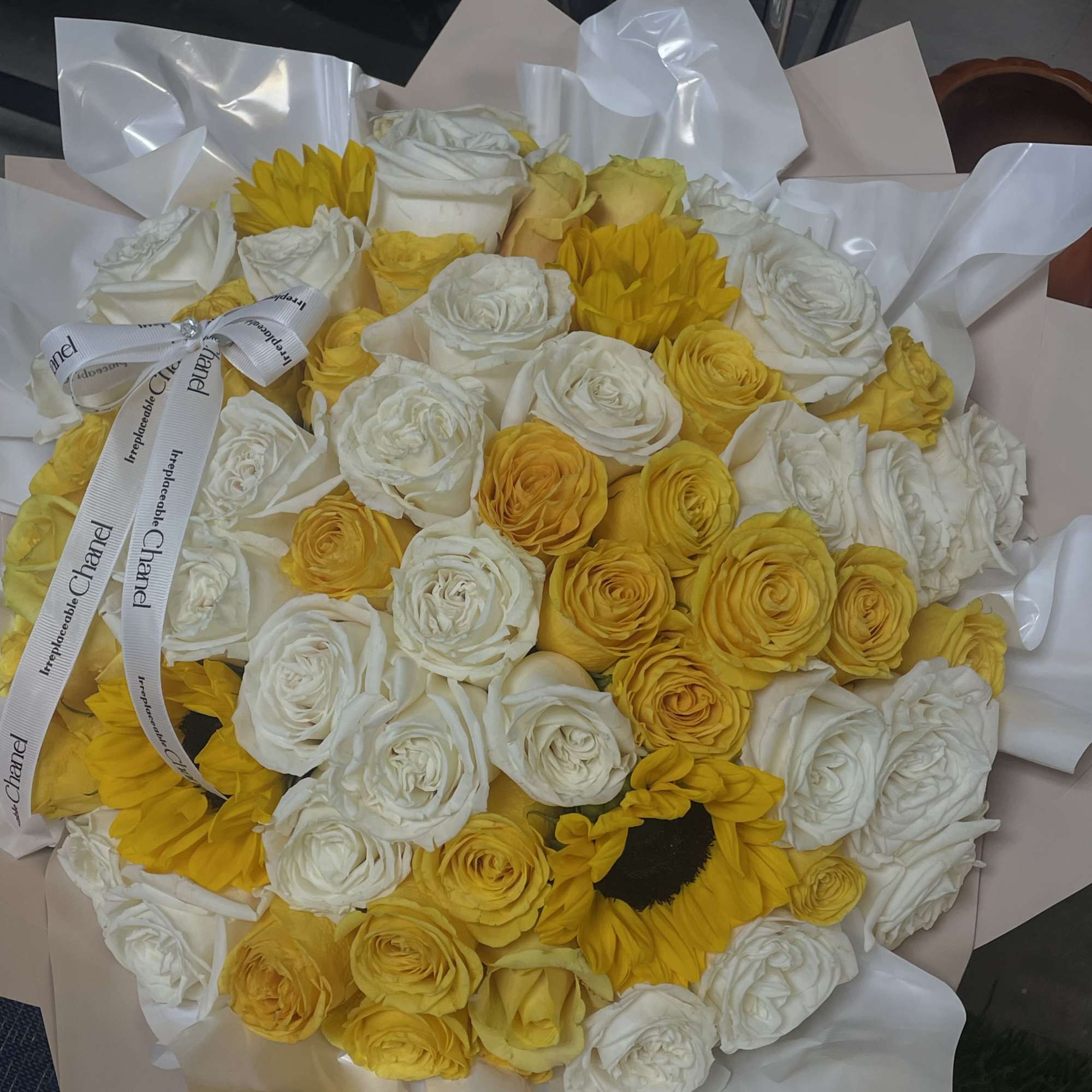 sunflowers and white roses and fillers
delux wrap
