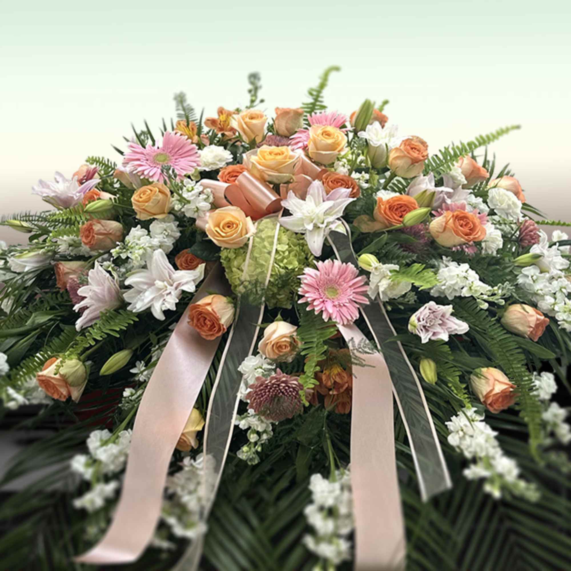 A gentle palette of blooms and palms.

Length 40" - 48" (101.6 x