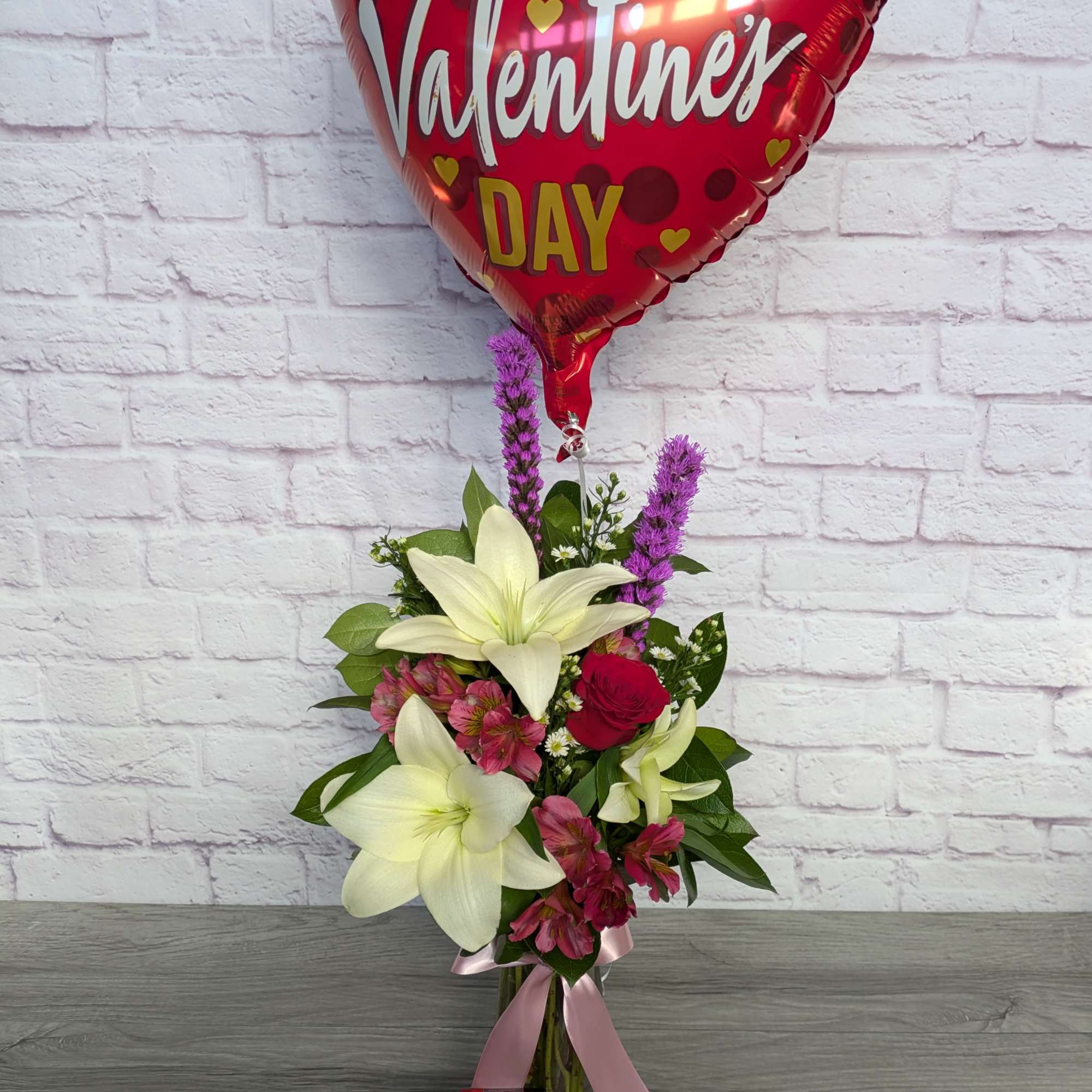 Sweet Valentine is A ladybug floral exclusive bouquet made with a mix