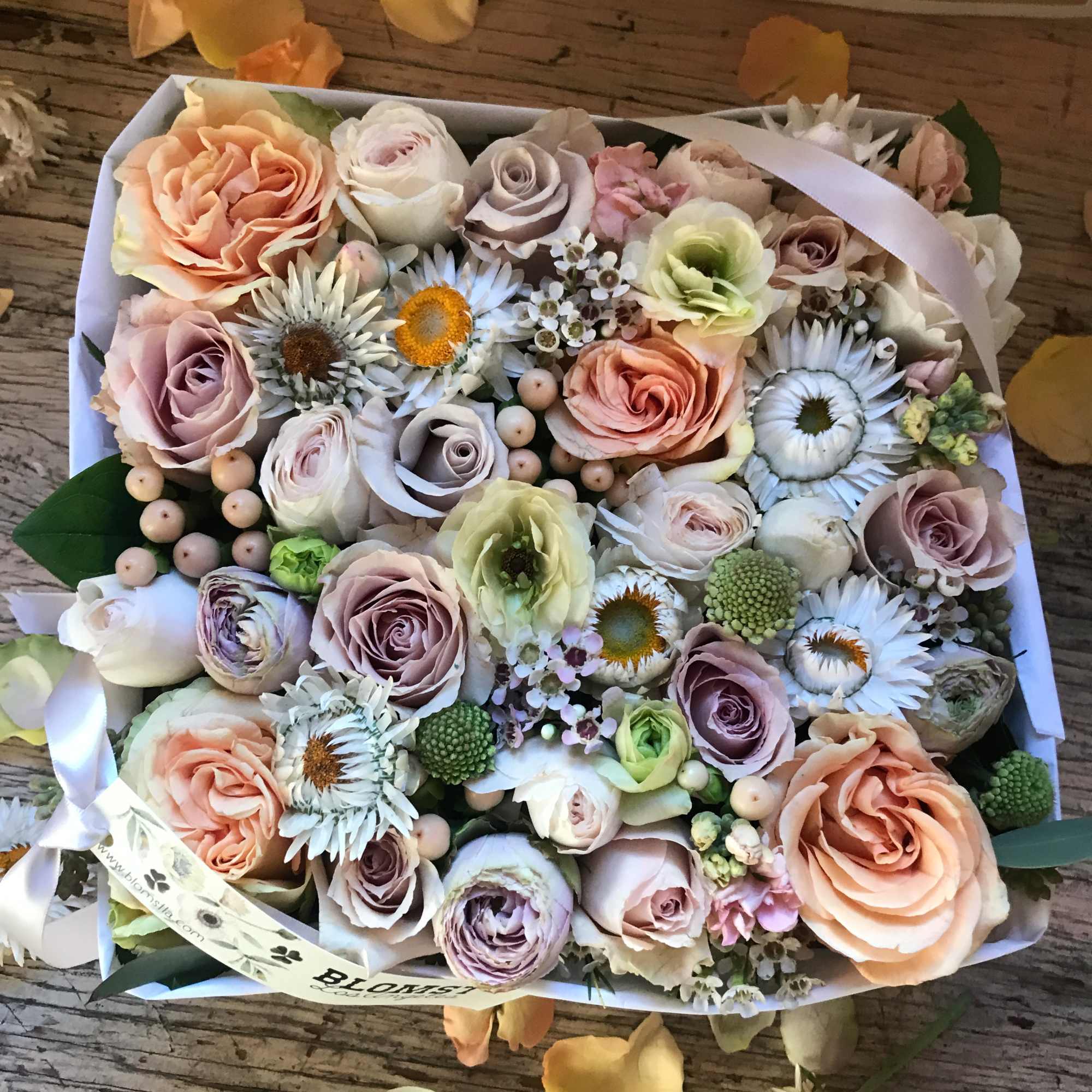 Beautiful blooming signature Blomst flower box full of fresh flowers in a