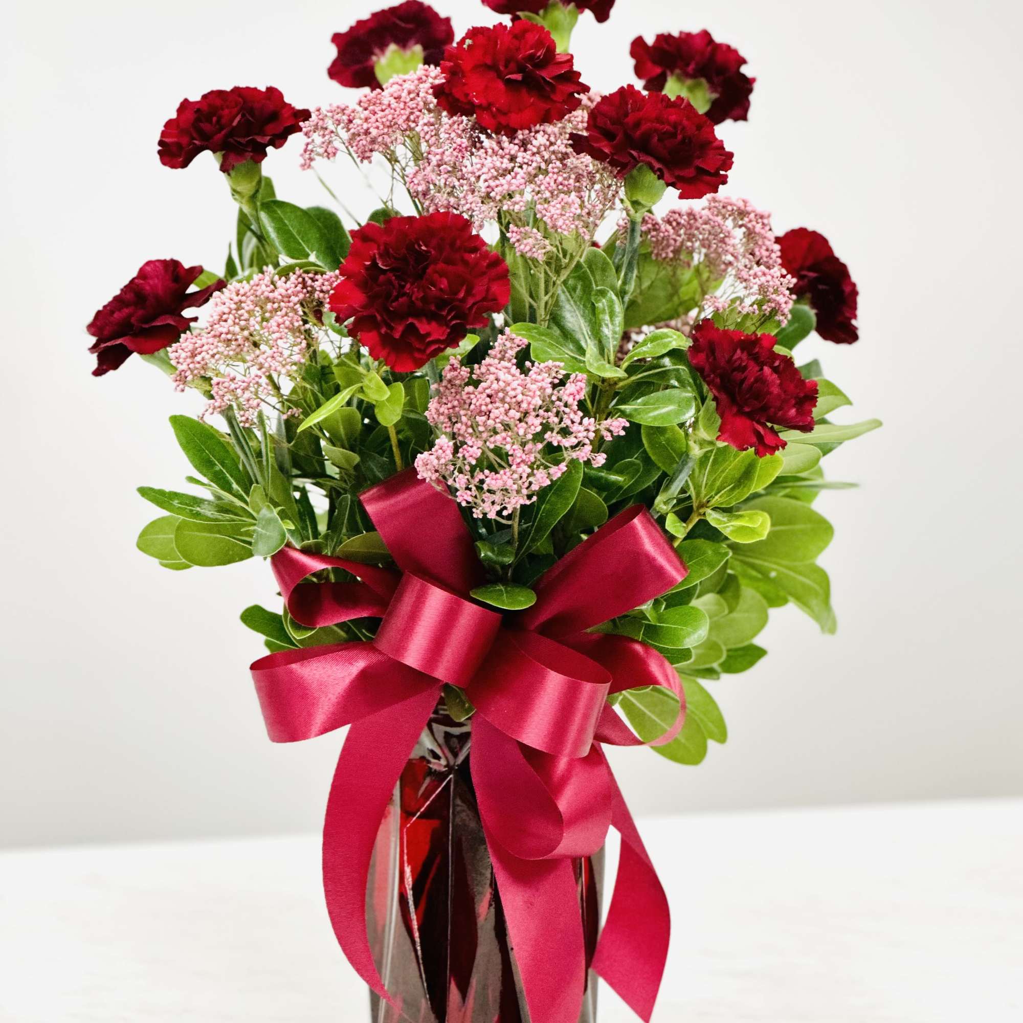 January's flower is the carnation, and Garnet is the birth stone of