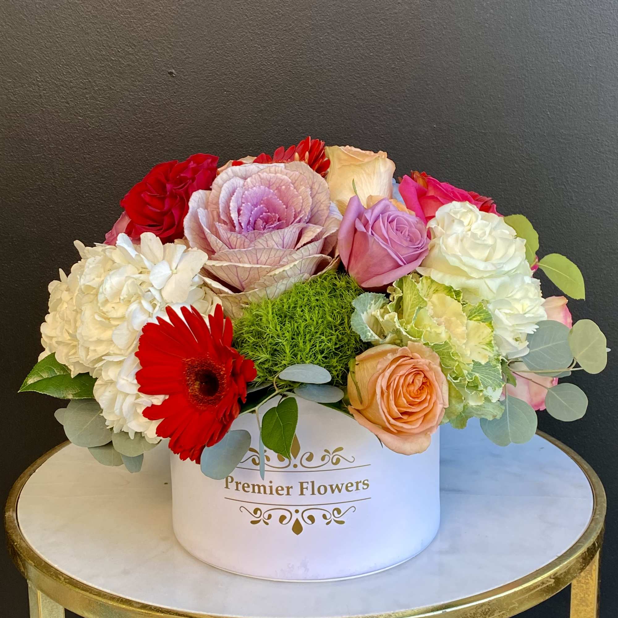 This signature flower box of love featuring an assortment of Roses, Hydrangeas