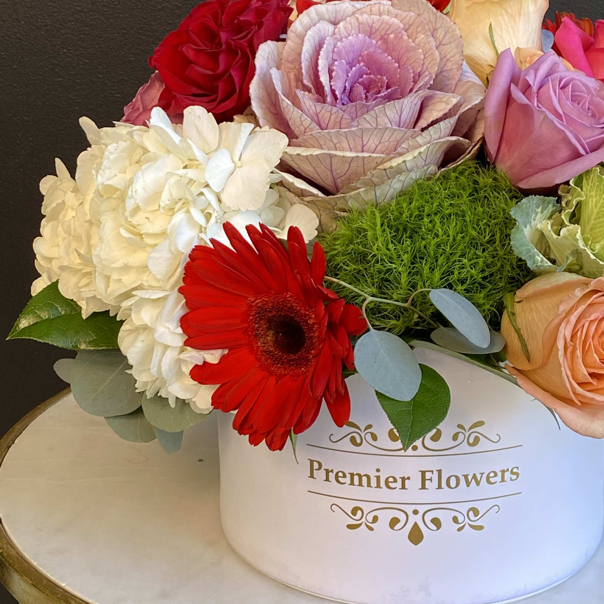 This signature flower box of love featuring an assortment of Roses, Hydrangeas