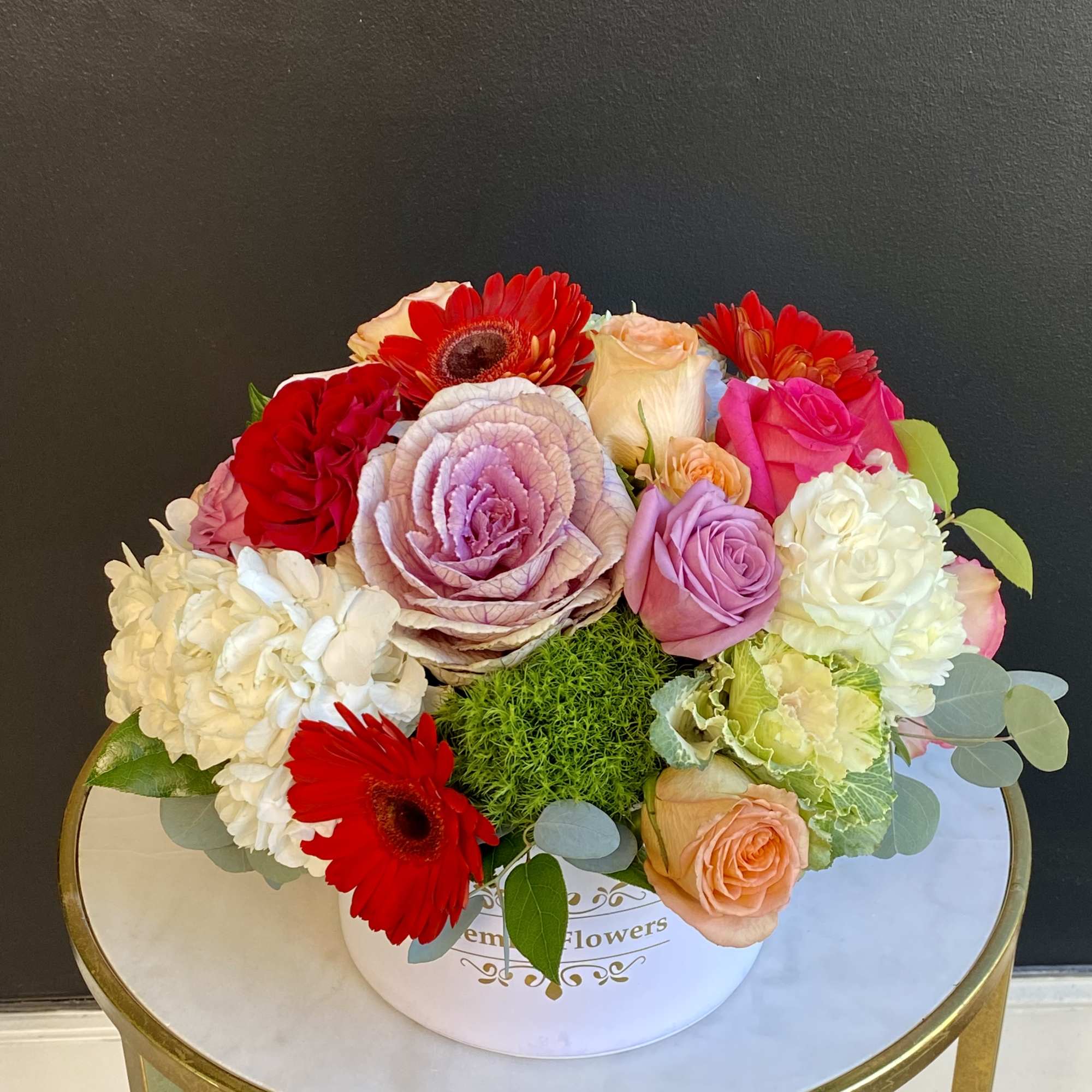 This signature flower box of love featuring an assortment of Roses, Hydrangeas