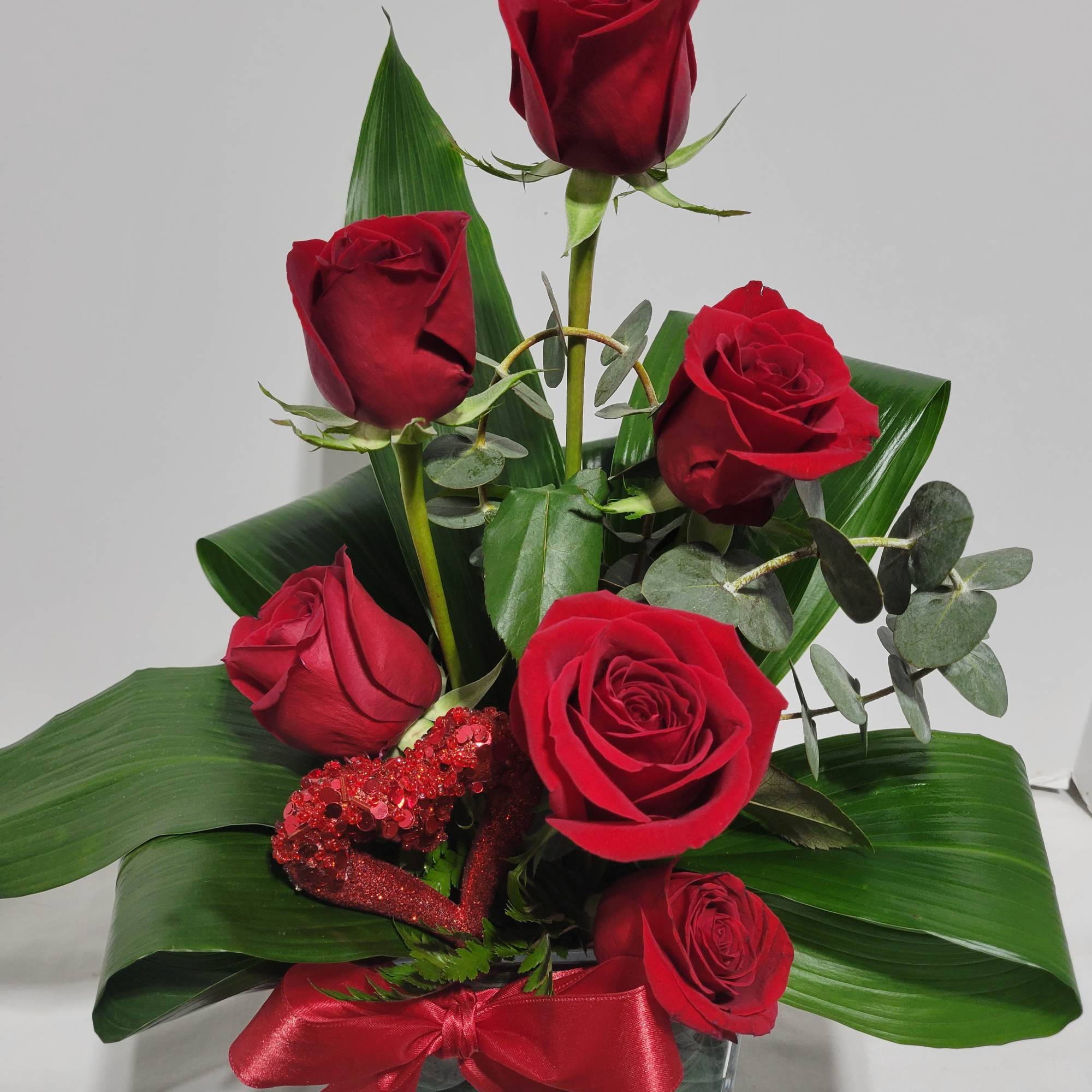 Surprise her  with this contemporary spin on the traditional roses. Stunning