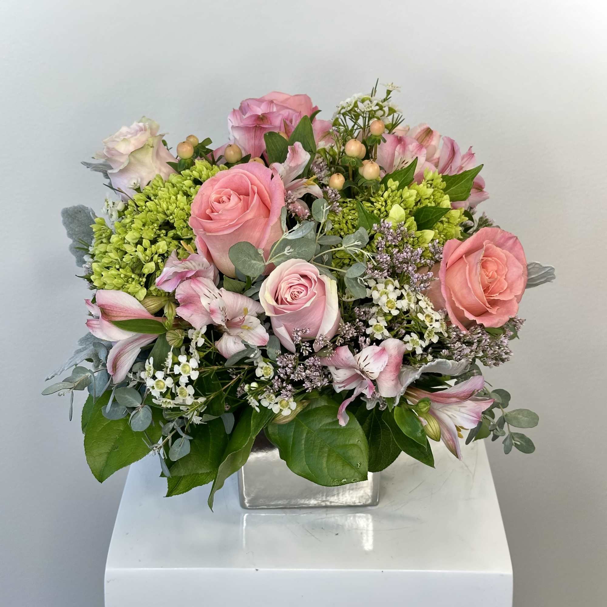 Lively Flower Arrangement &ndash; Pink Roses, Alstroemerias &amp; Green Hydrangea:
Energize any space