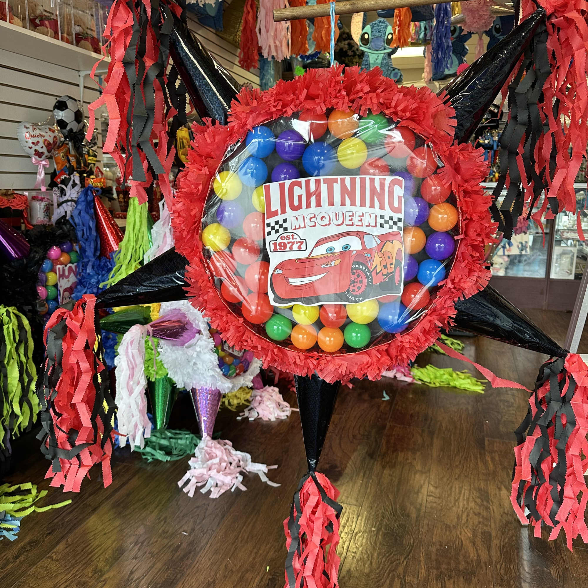 Ball pi&ntilde;atas with ample space for different themed sweets