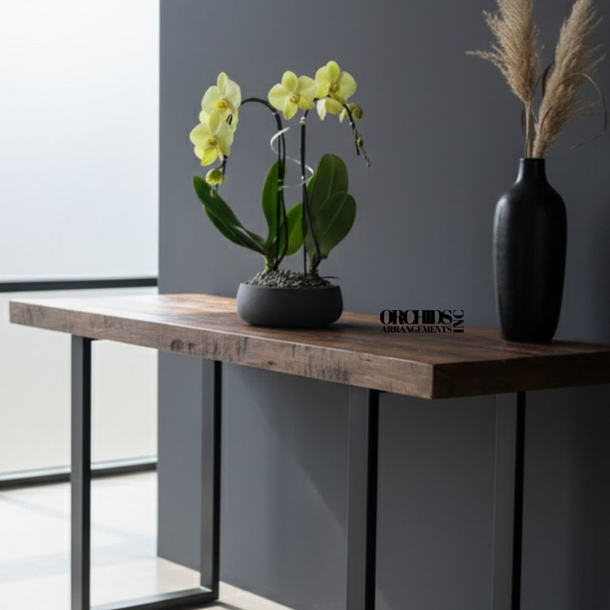 A high quality Double yellow orchid arrangement with a vase 8.5" D