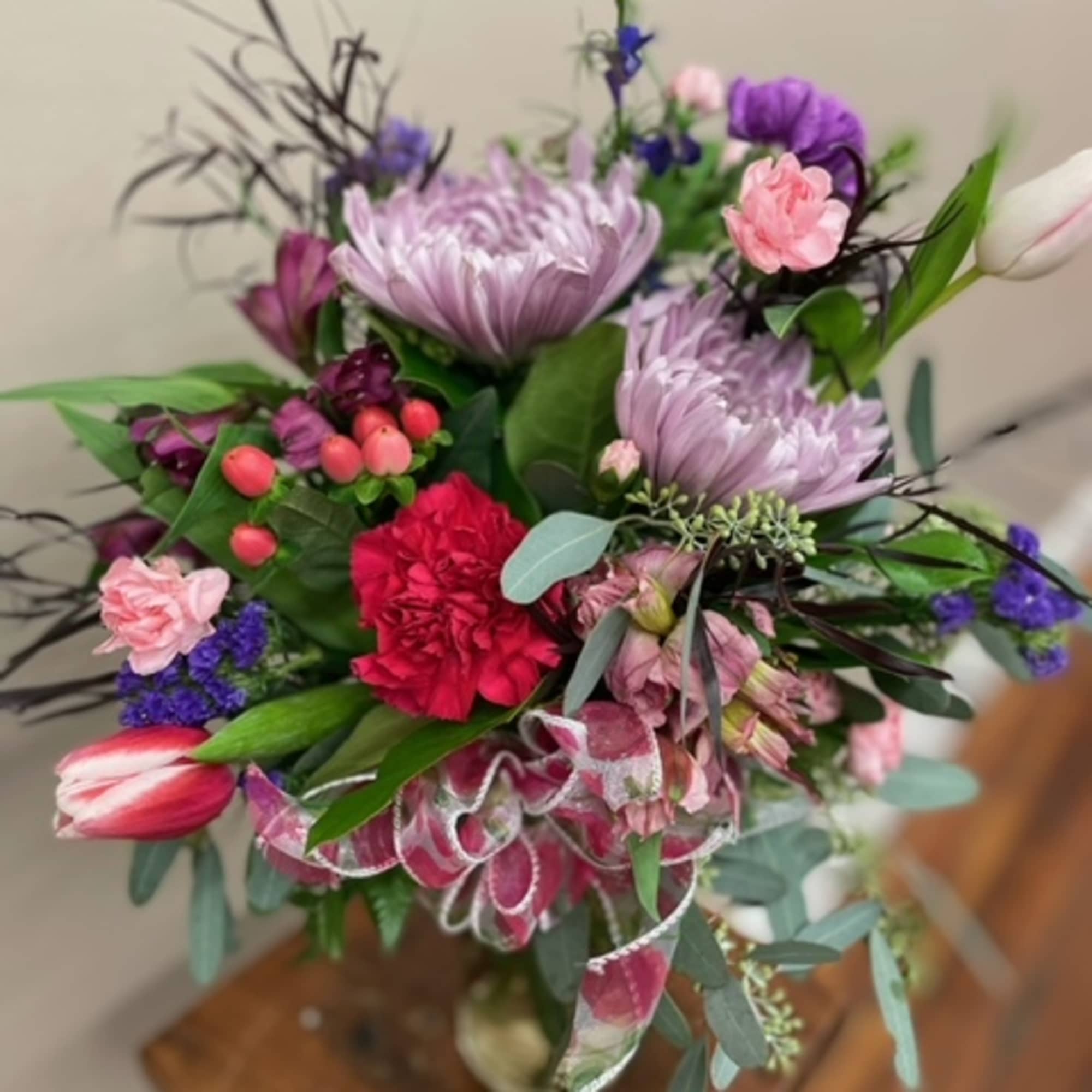 Prefer a traditional glass vase arrangement? Let our talented designers create a