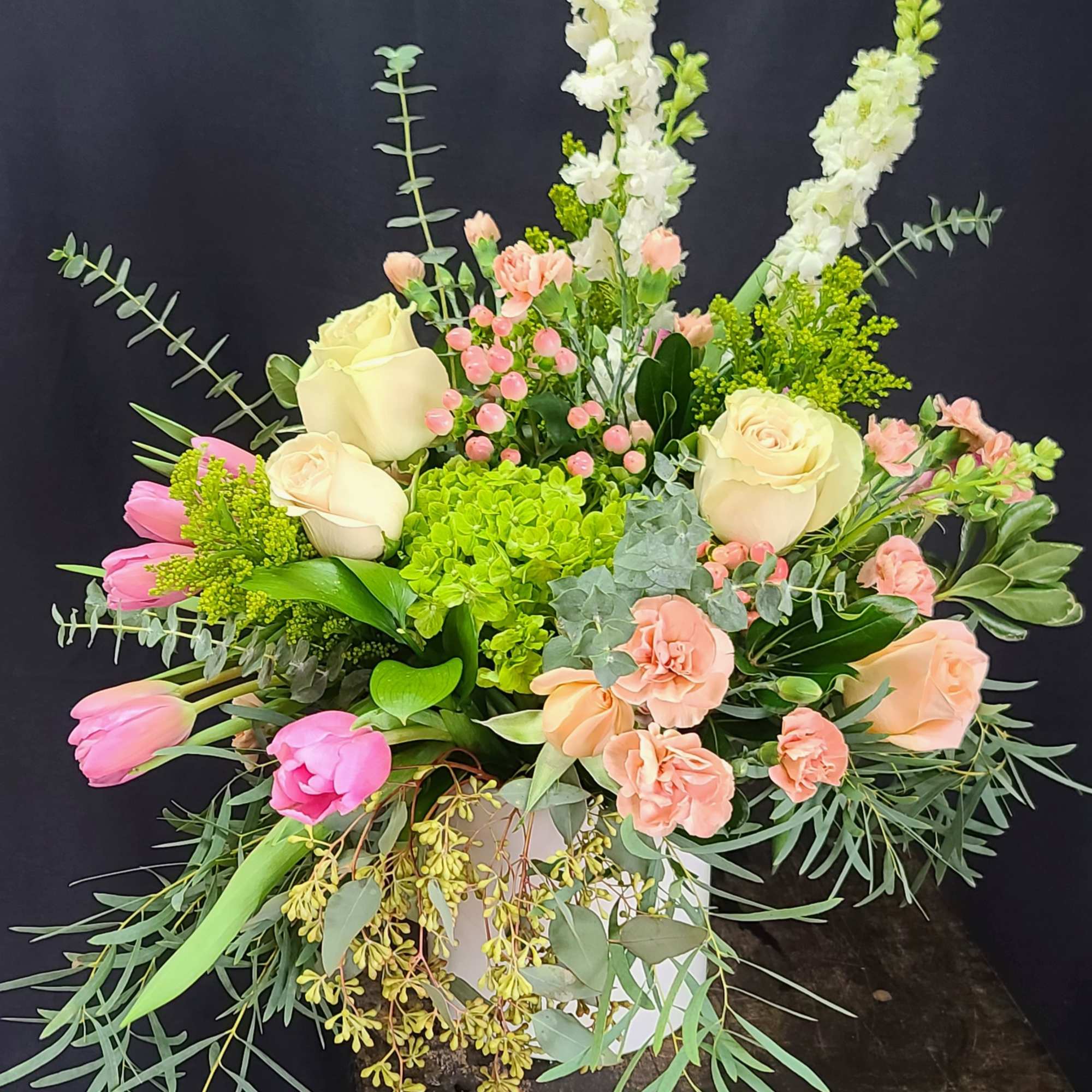Stunning, lush eco-friendly arrangement of green Hydrangea, creamy roses, pink hypericum, pink