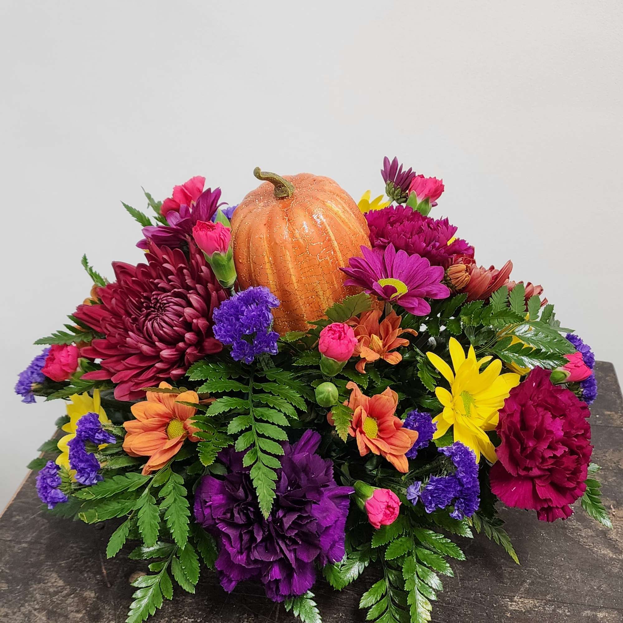 Our designers will create a beautiful fall display to enhance your Thanksgiving