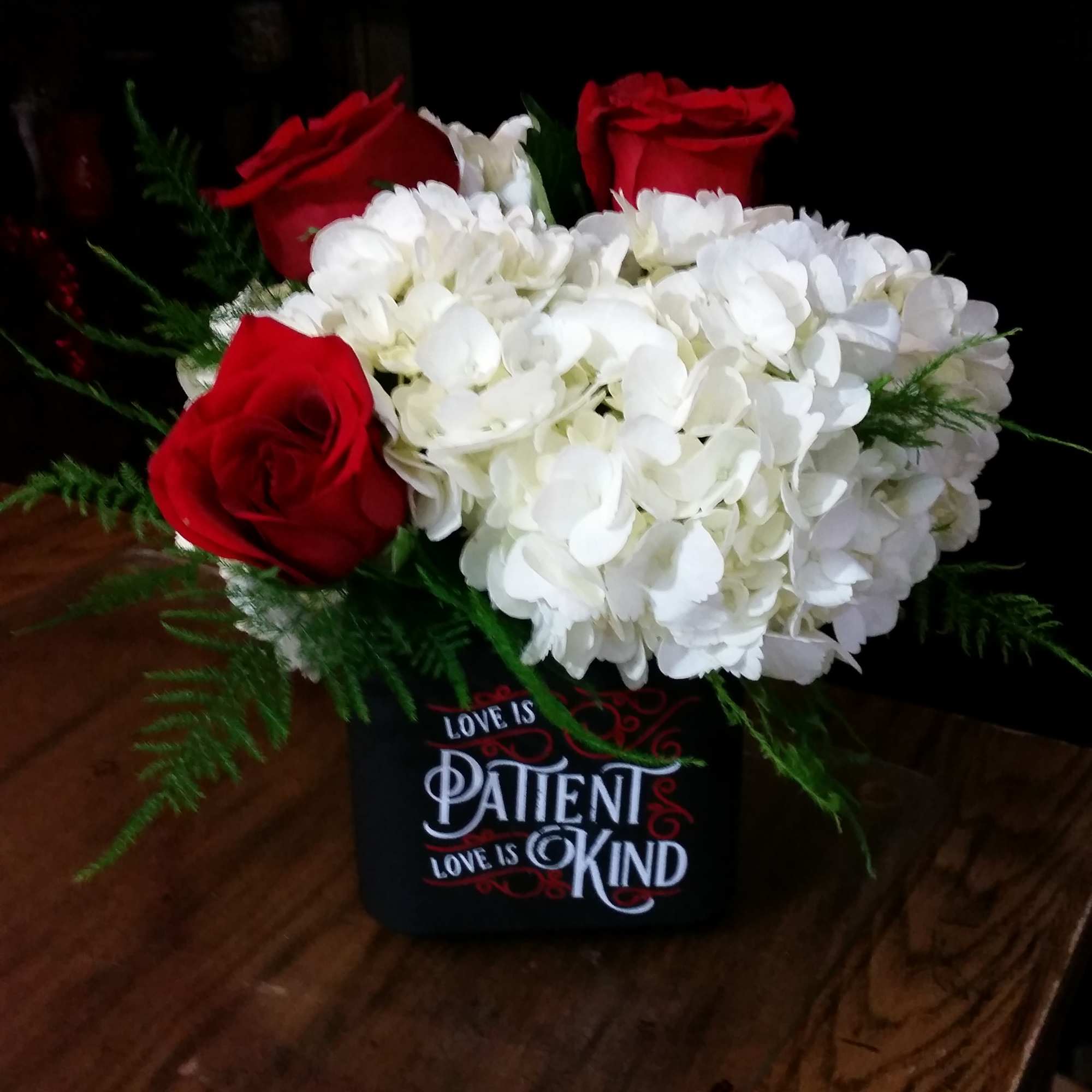 Our Signature Keepsake Cube Arrangement filled to bursting with beautiful White Hydrangeas