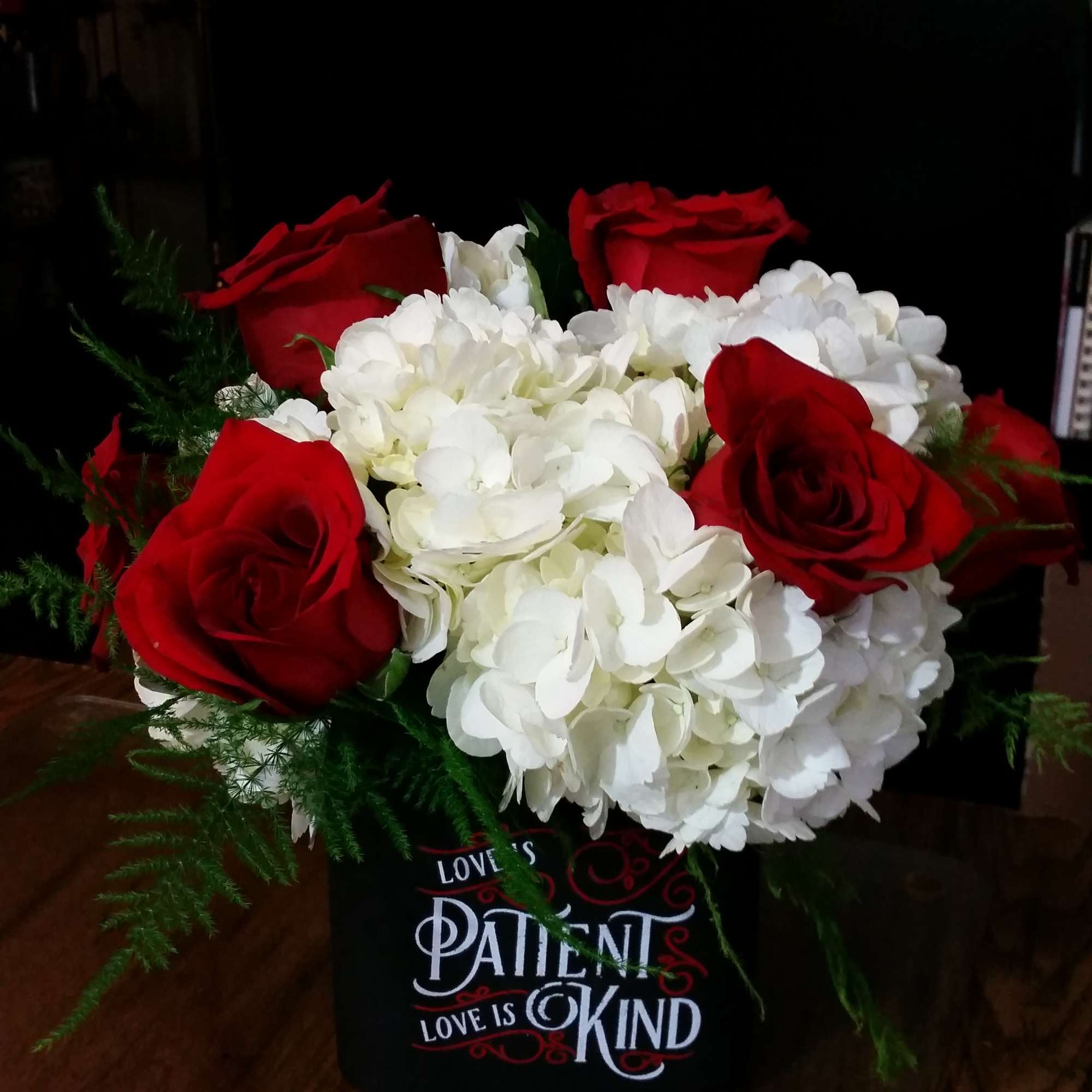 Our Signature Keepsake Cube Arrangement filled to bursting with beautiful White Hydrangeas