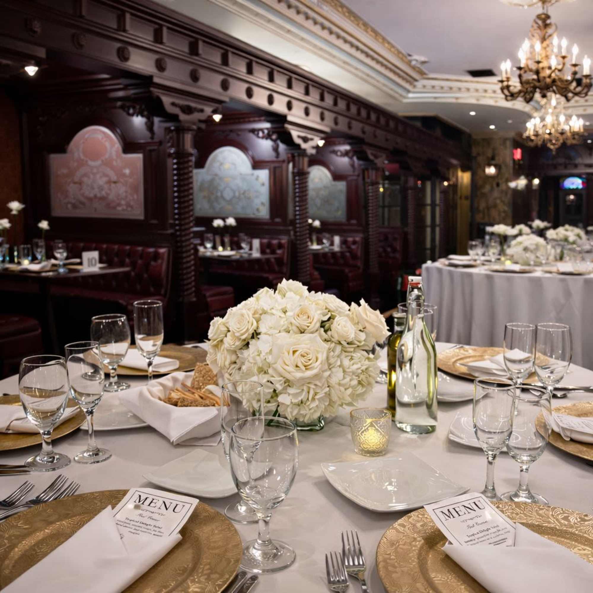 White Sonata is a graceful, all-white centerpiece composed of lush premium blooms