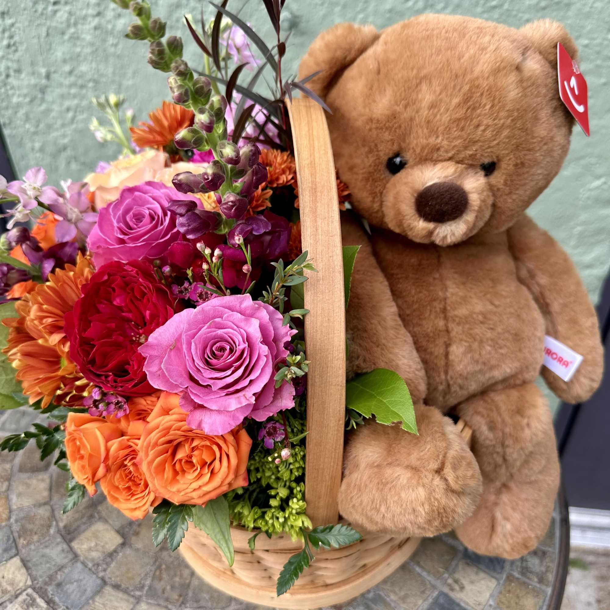 Lovely duet of beautiful floral arrangement and a super soft bear in