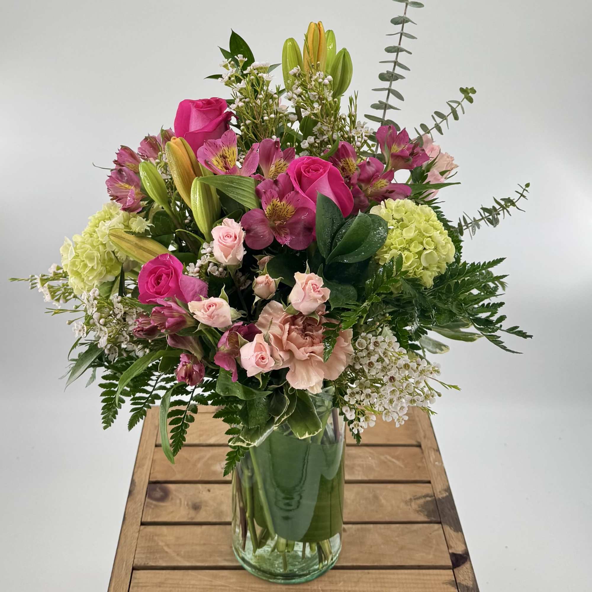 Introducing "Blush Life," a delightful flower arrangement that combines vibrant shades of