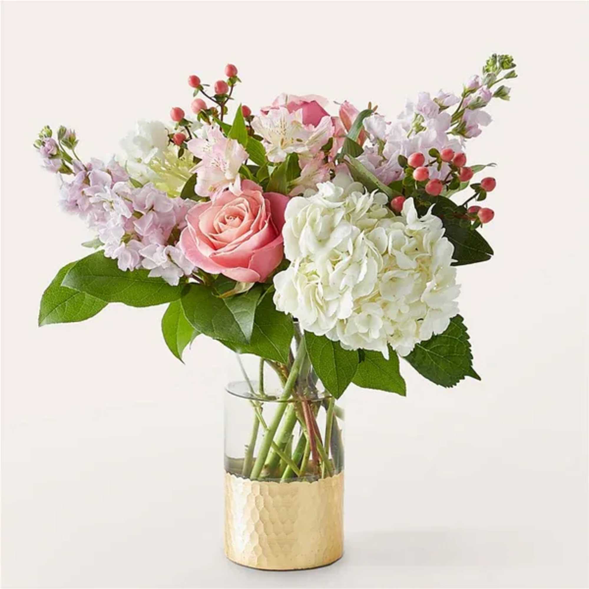 Luxury arrives at their doorstep with this beautiful bouquet of soft pink