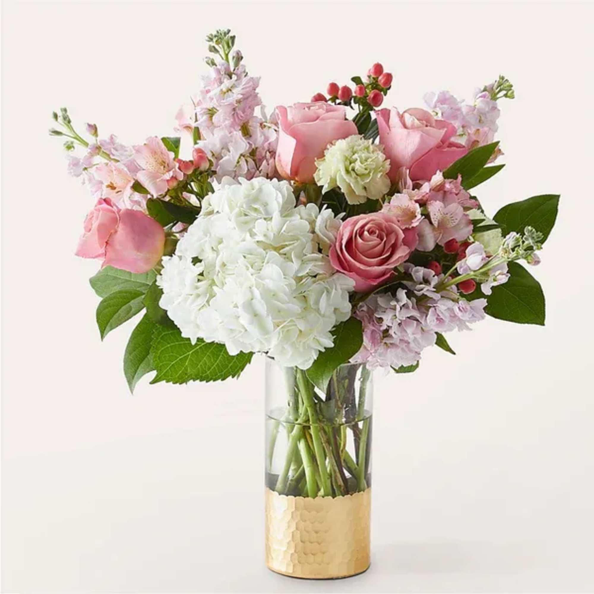 Luxury arrives at their doorstep with this beautiful bouquet of soft pink