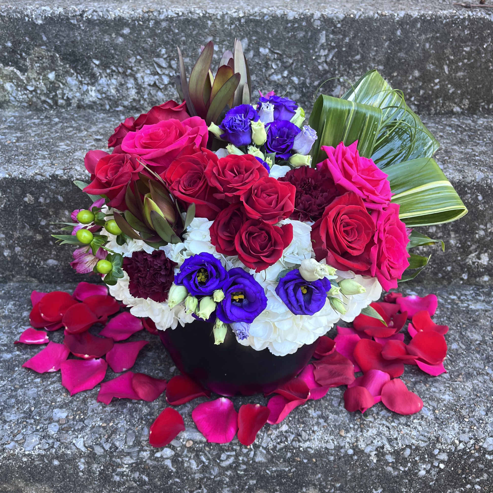 This beautifully designed arrangement is filled with hydrangea, roses, spray roses, Lisianthus