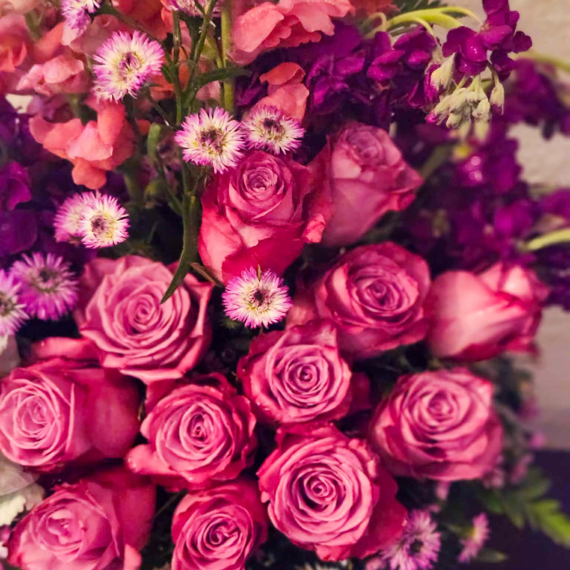 For the special individual that loves Purple. This specially designed arrangement combines