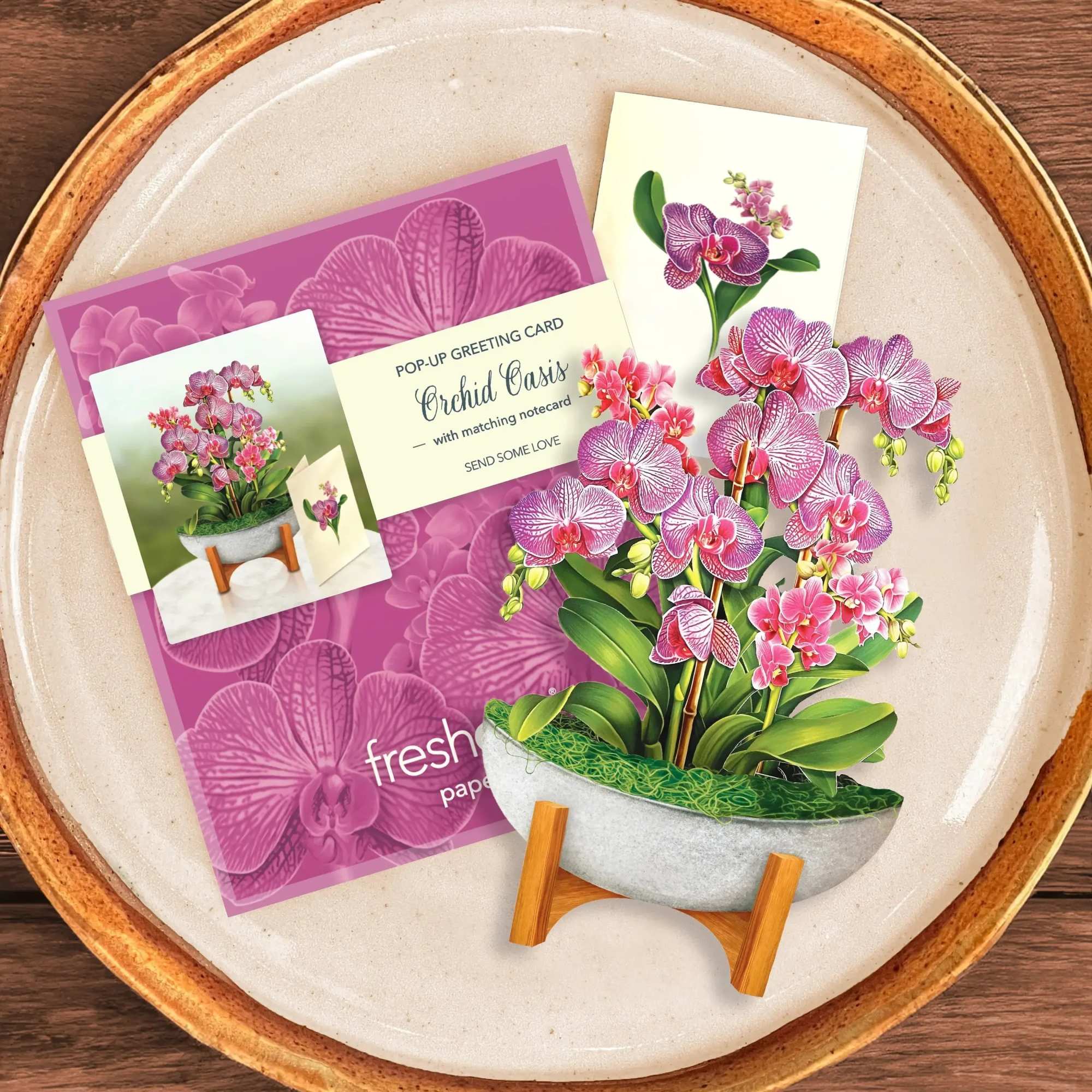 Inspired by a tropical getaway, these luxurious and striking orchid blooms embody