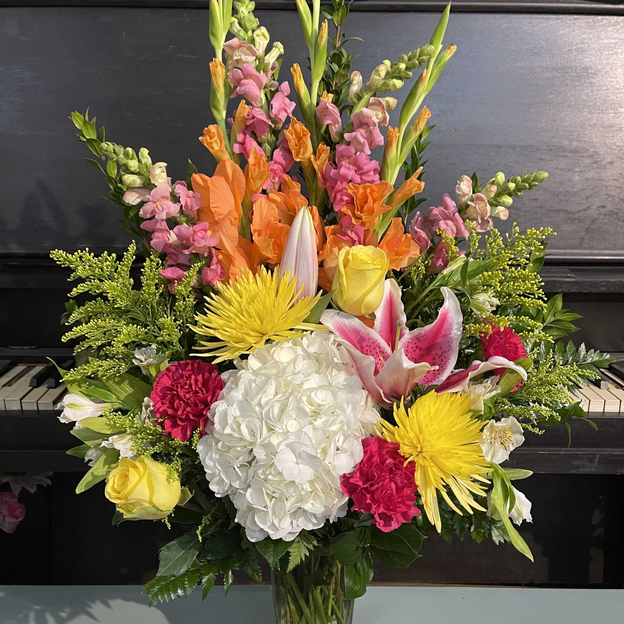 Our colorful mix arrangements are DESIGNERS CHOICE. Meaning there will be no