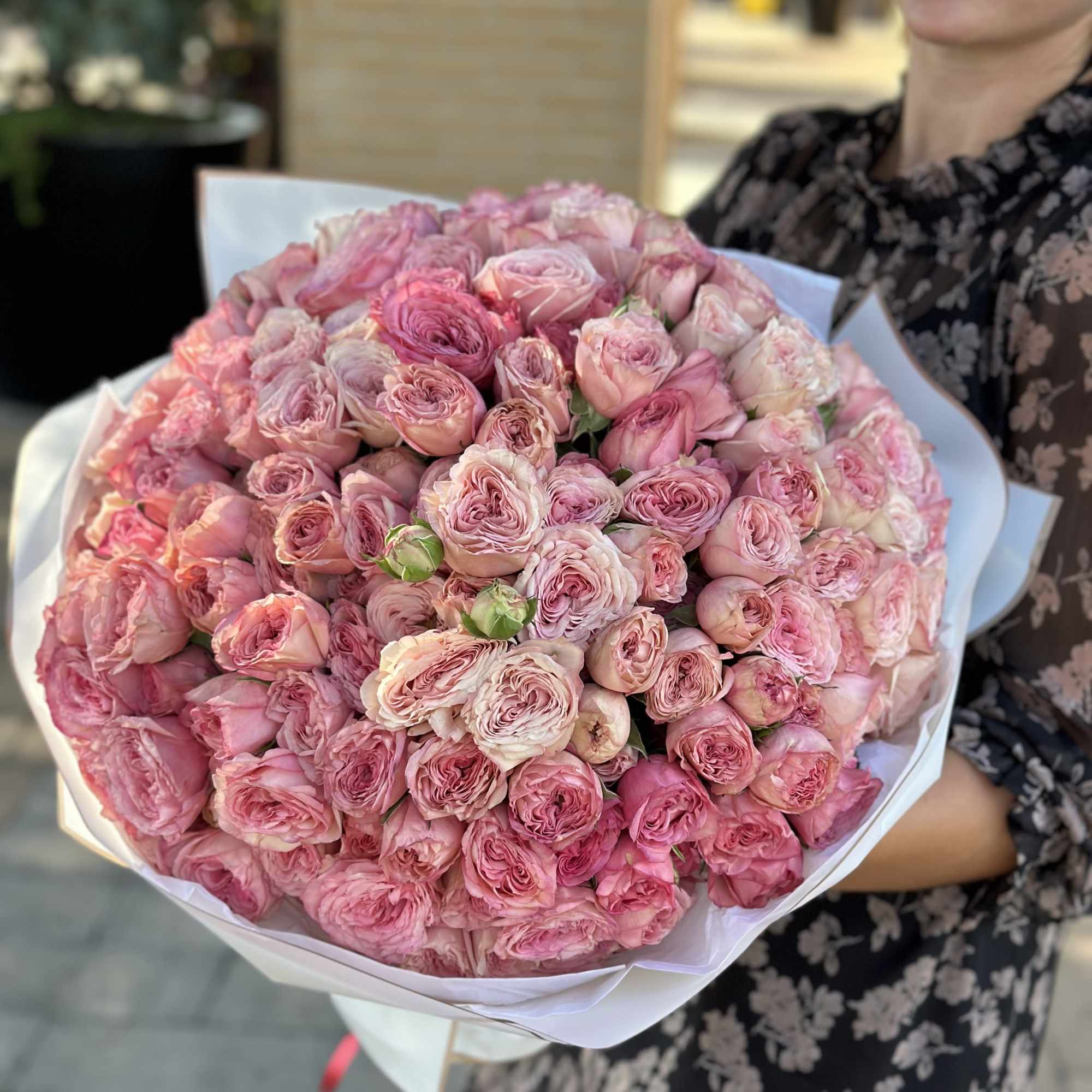 A breathtaking bouquet of lush garden roses in tender shades of pink