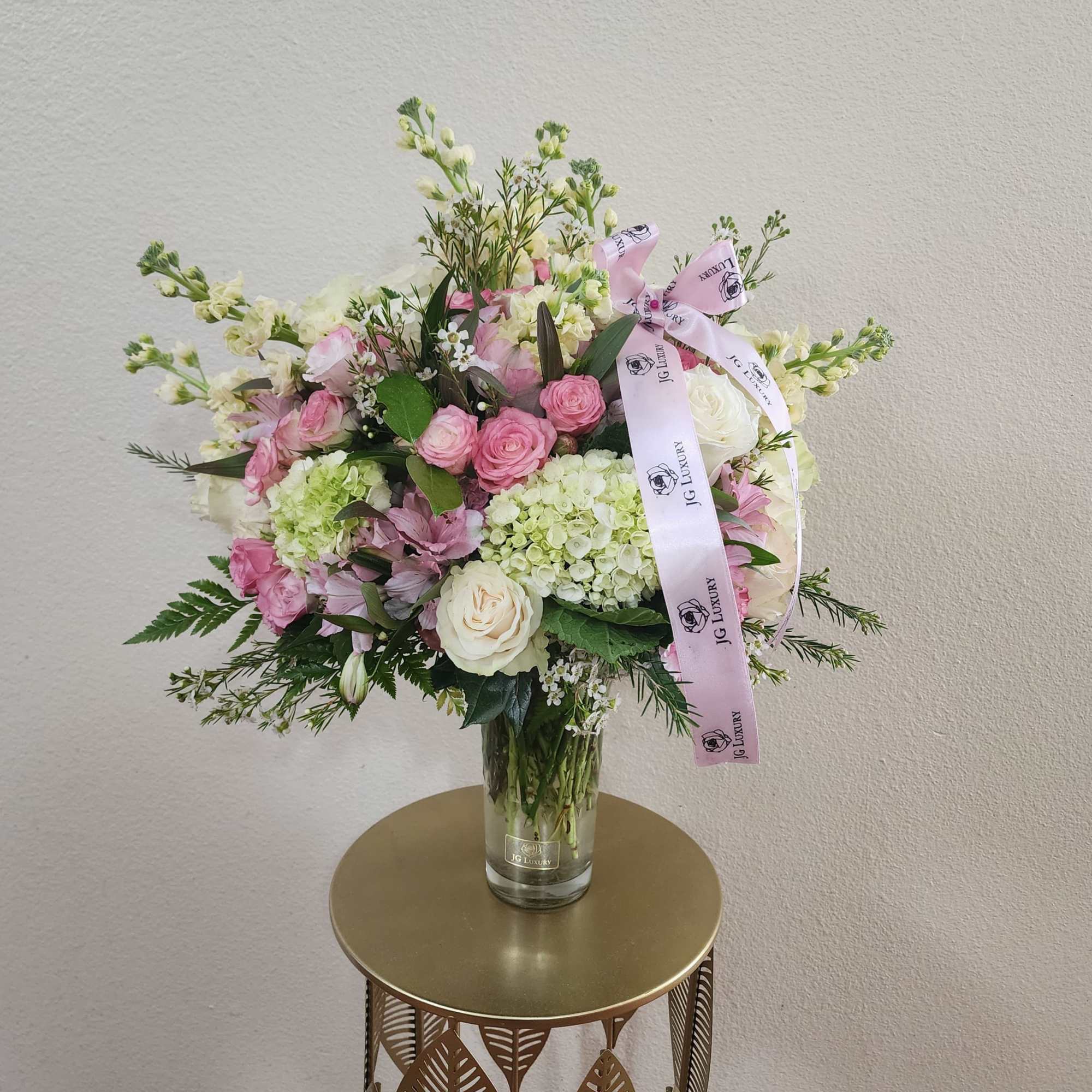 Created to make you smile with the perfect mix of fress blooms.