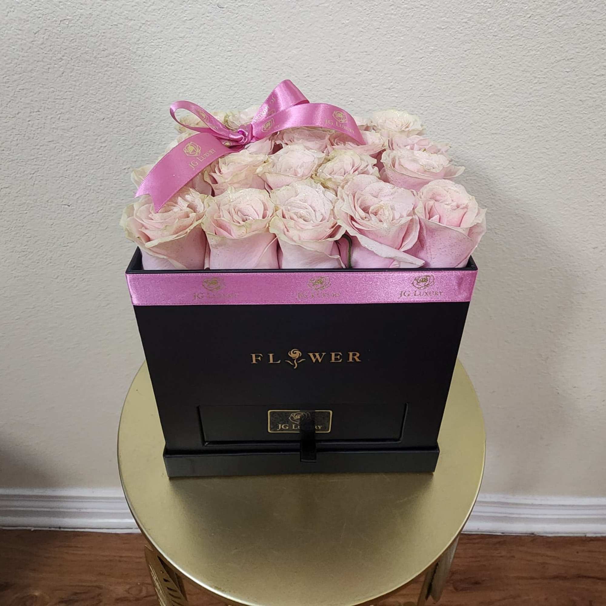 An elegant arrangement of 20 Ecuatorian soft blush barbie pink roses presented