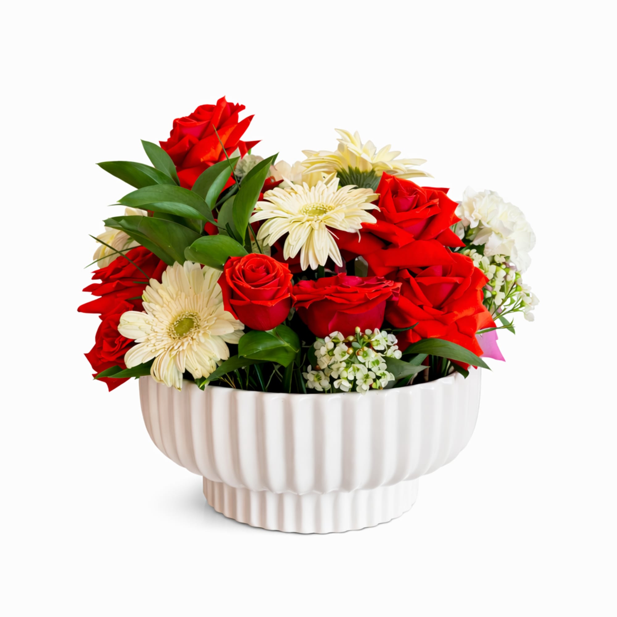 Our Vase Versa Collection pairs hand-selected flowers with stylish vases for a