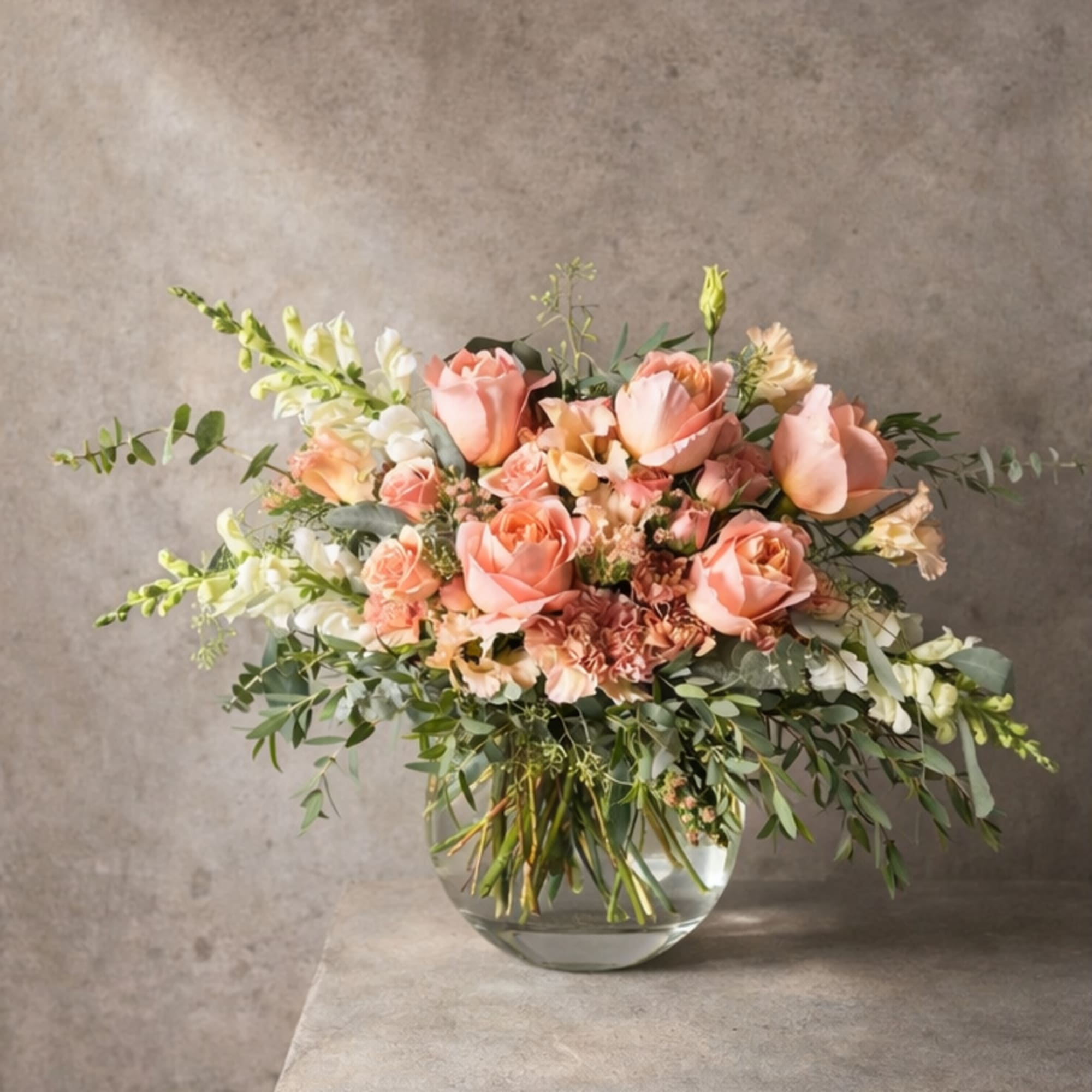 Enchanted Rose Garden is a romantic floral arrangement designed in blush and
