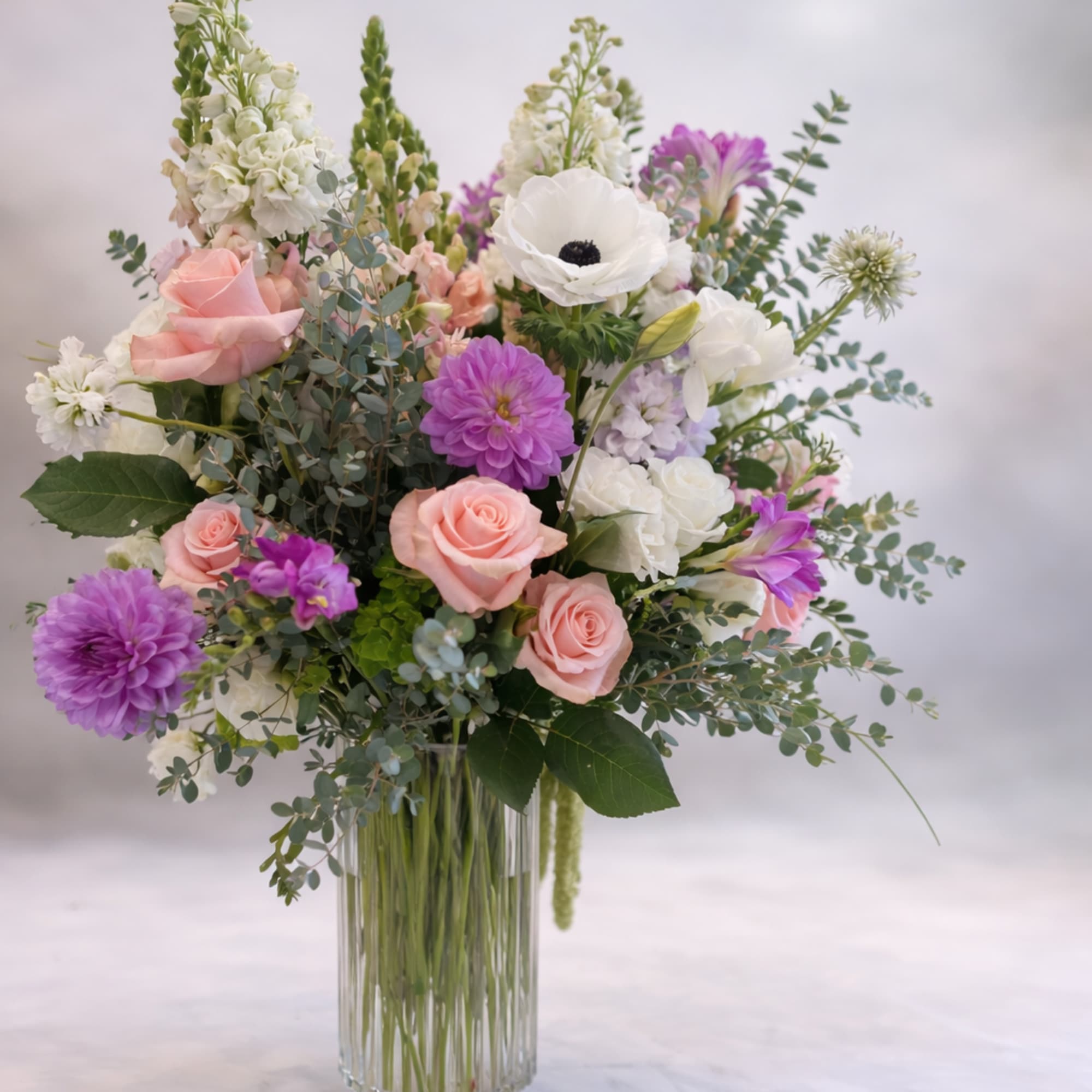 Flowers: roses, stock, delphinium, orchids, snapdragons, lisianthus, anemones, dahlias,  freesia, eucalyptus