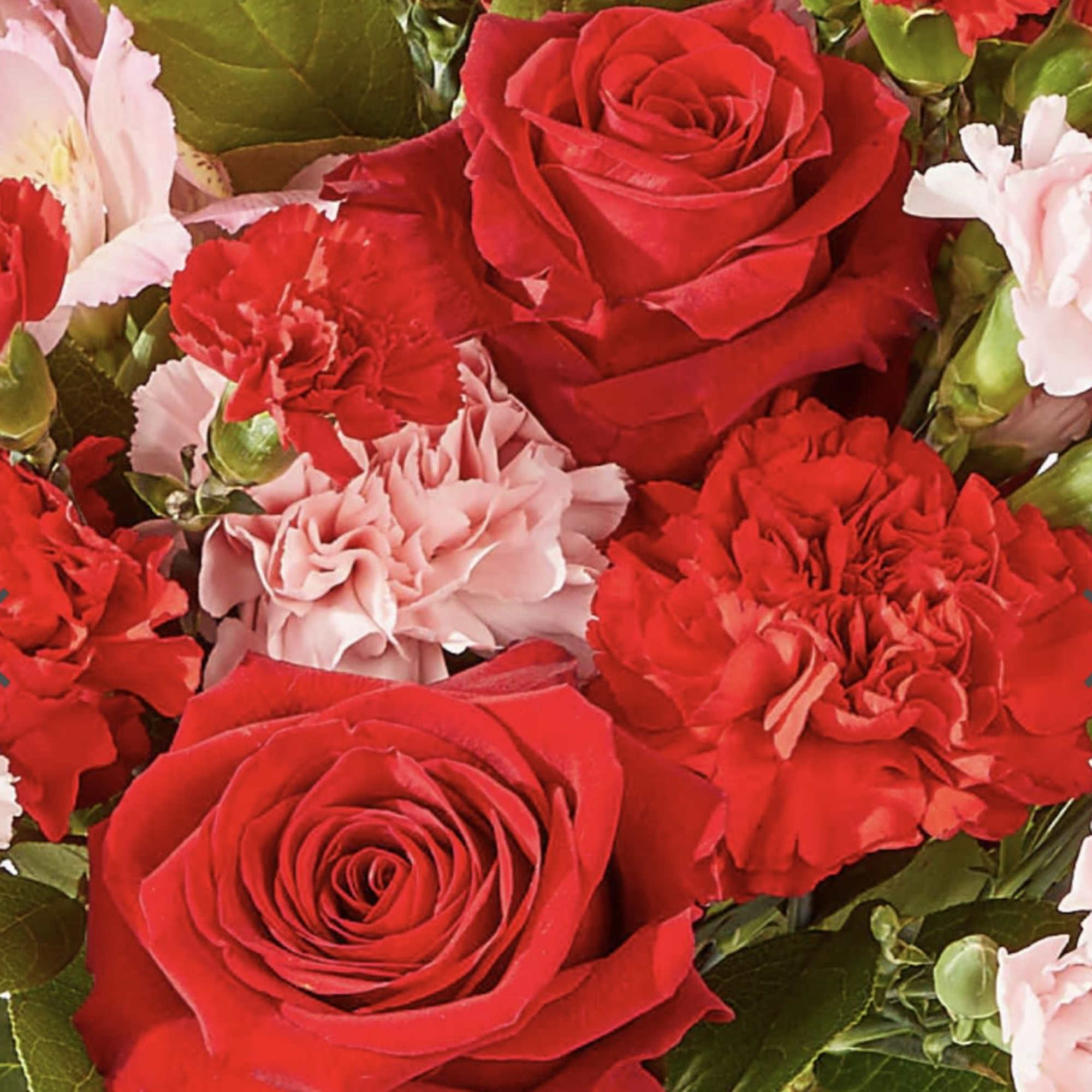 As sweet as candy, this pink and red arrangement is sure to