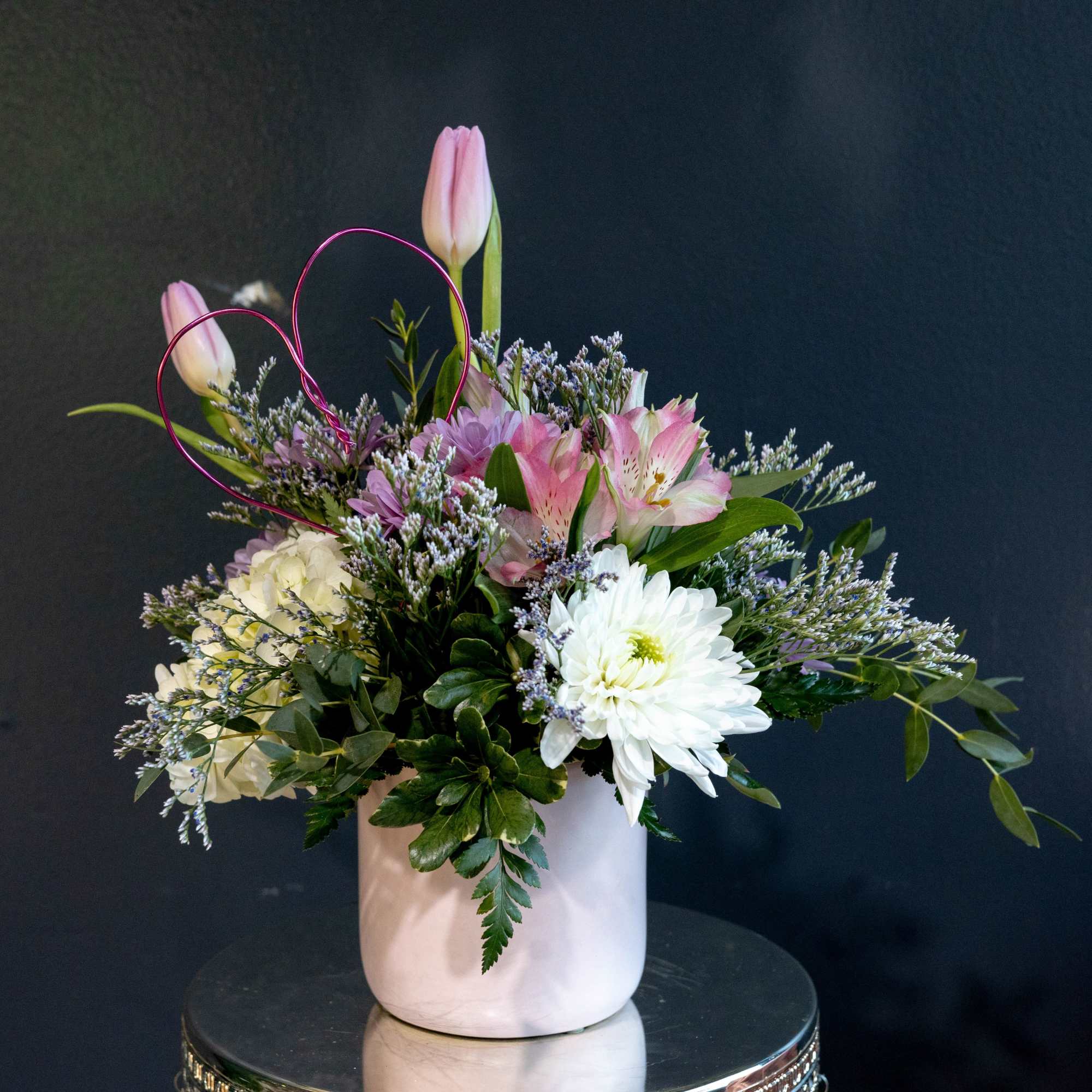 This short sweet arrangement is a soft expression of love, designed to