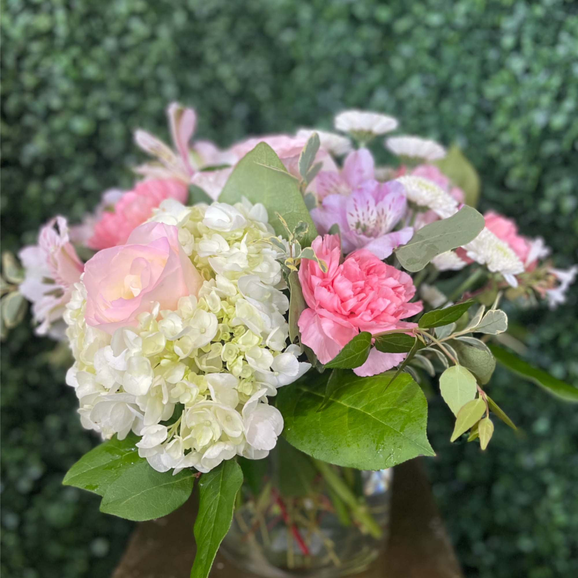 Delicate, graceful, and full of charm &mdash; this floral arrangement is a