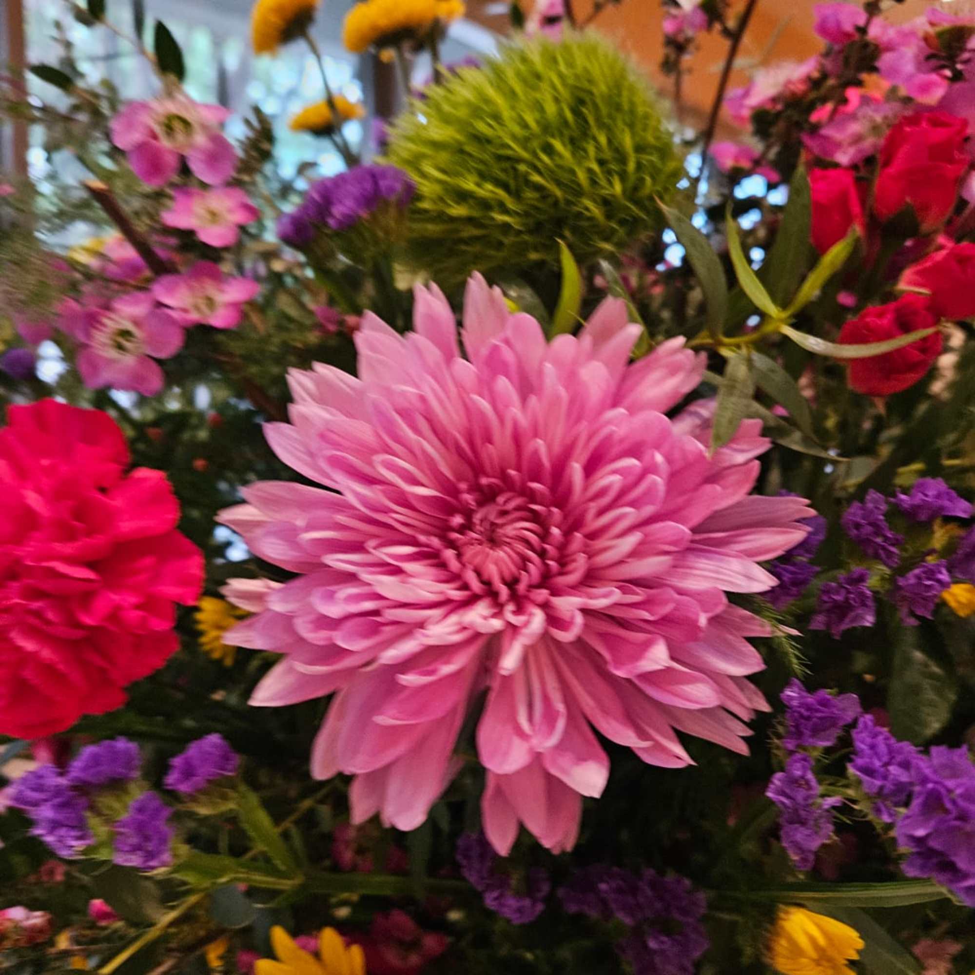 A striking blend of vibrant floral and lush greenery.