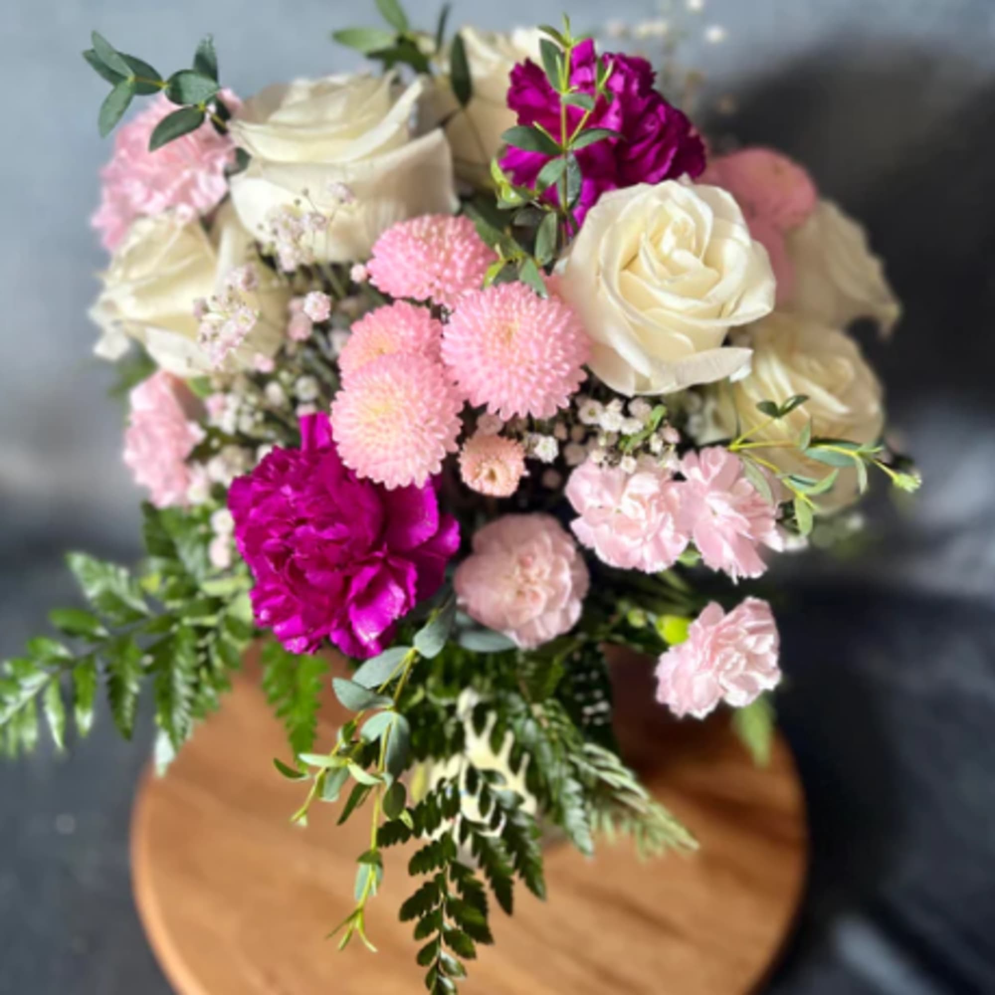 Welcome to our "Blush Blossoms" a captivating flower arrangement where the delicate