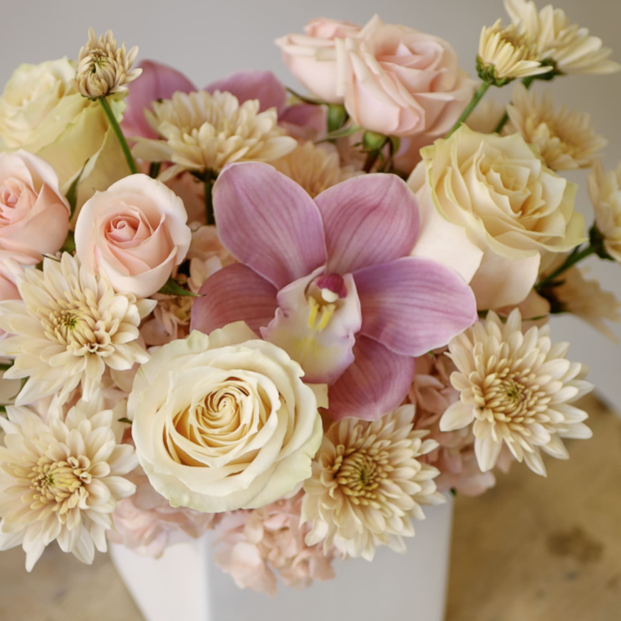 This elegant Valentine&rsquo;s Day arrangement showcases a delicate palette of blush pink