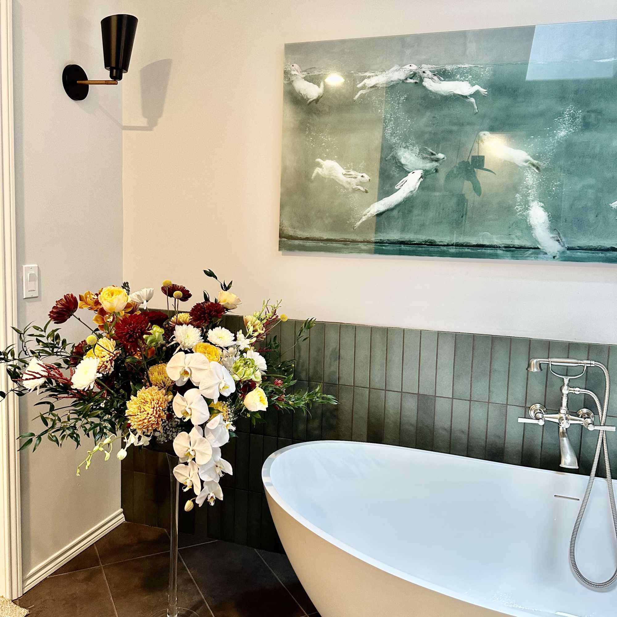 This is a Tall floral arrangement with very generous ,editorial presence -artful