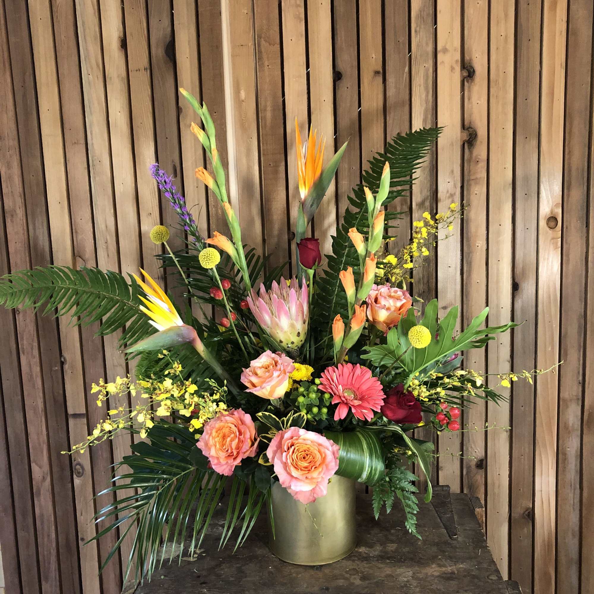 Bring the beauty of the tropics to life with this vibrant bouquet