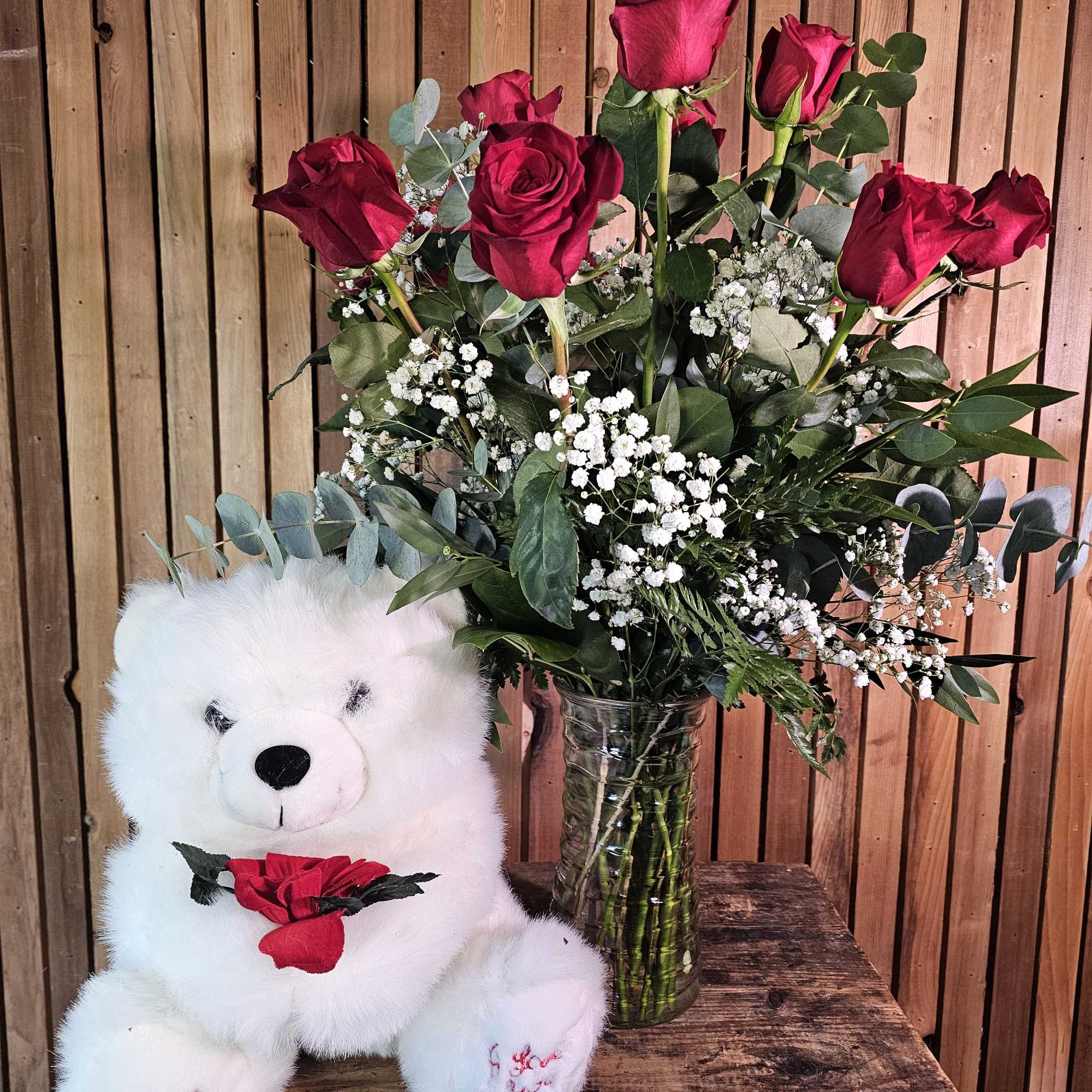 This beautiful bouquet of 1 dozen roses will be specially designed for