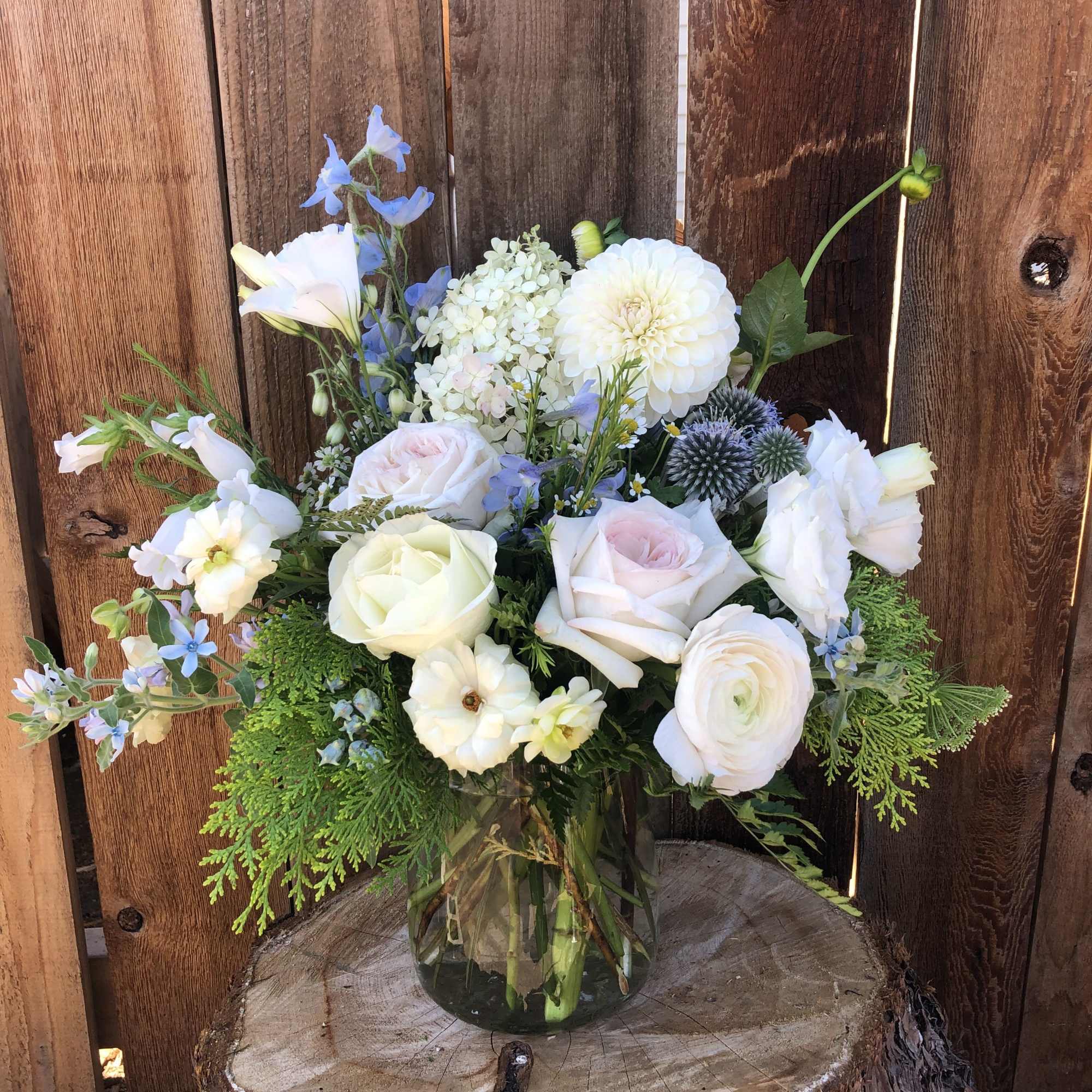 A carefully curated floral design created by our expert florists using premium