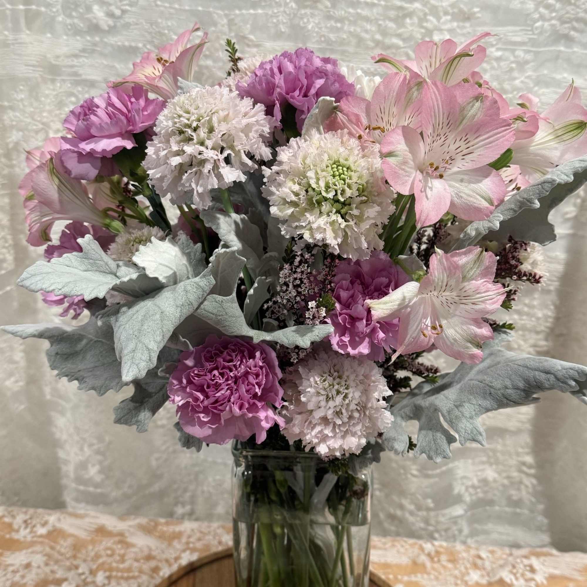 Rose free arrangement

Scabiosa, Carnations, Alstroemeria, and Dusty Miller