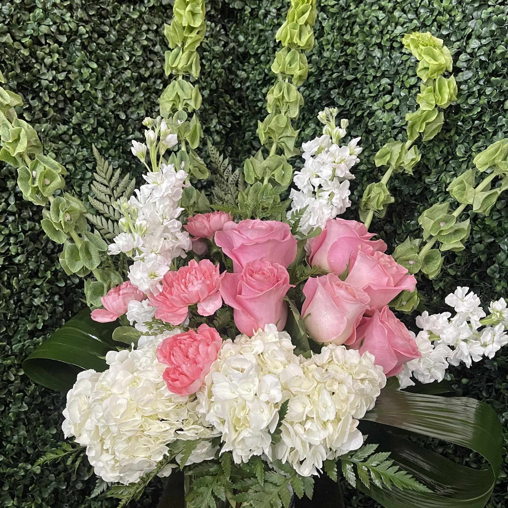 A pink luxury arrangement? Sign us up. Instead of sending standard red