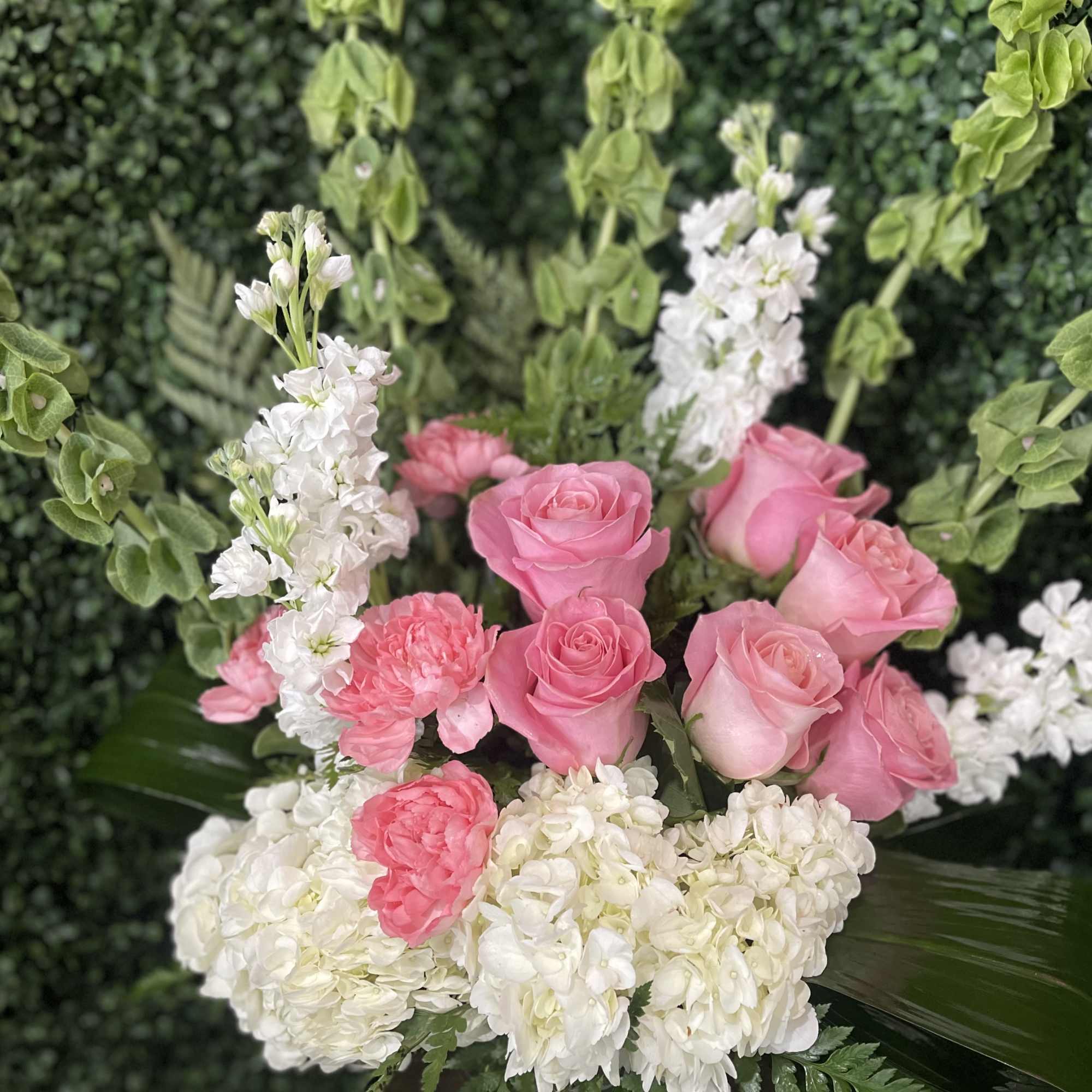 A pink luxury arrangement? Sign us up. Instead of sending standard red