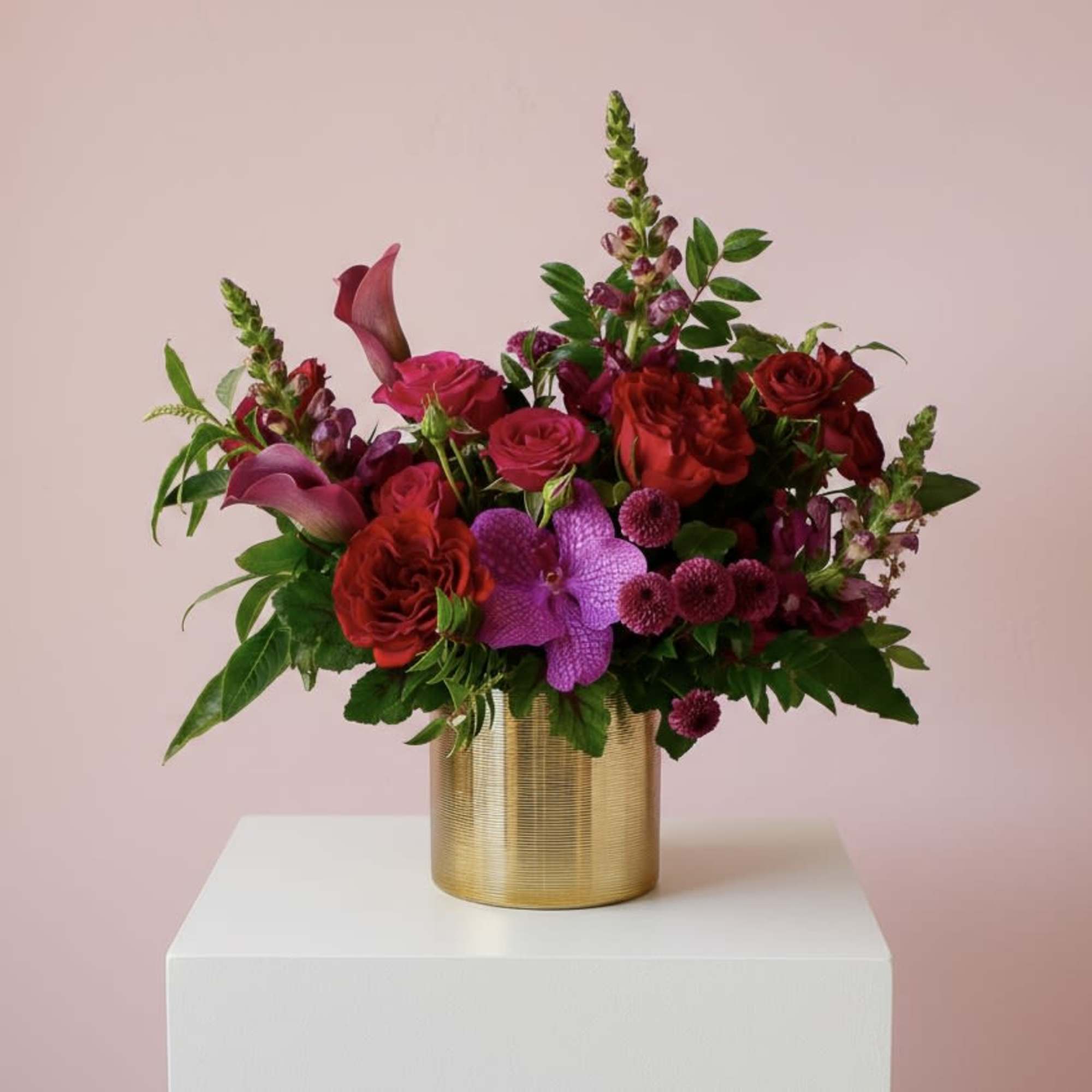 Velvet Obsession is a striking Valentine&rsquo;s Day arrangement designed to make a