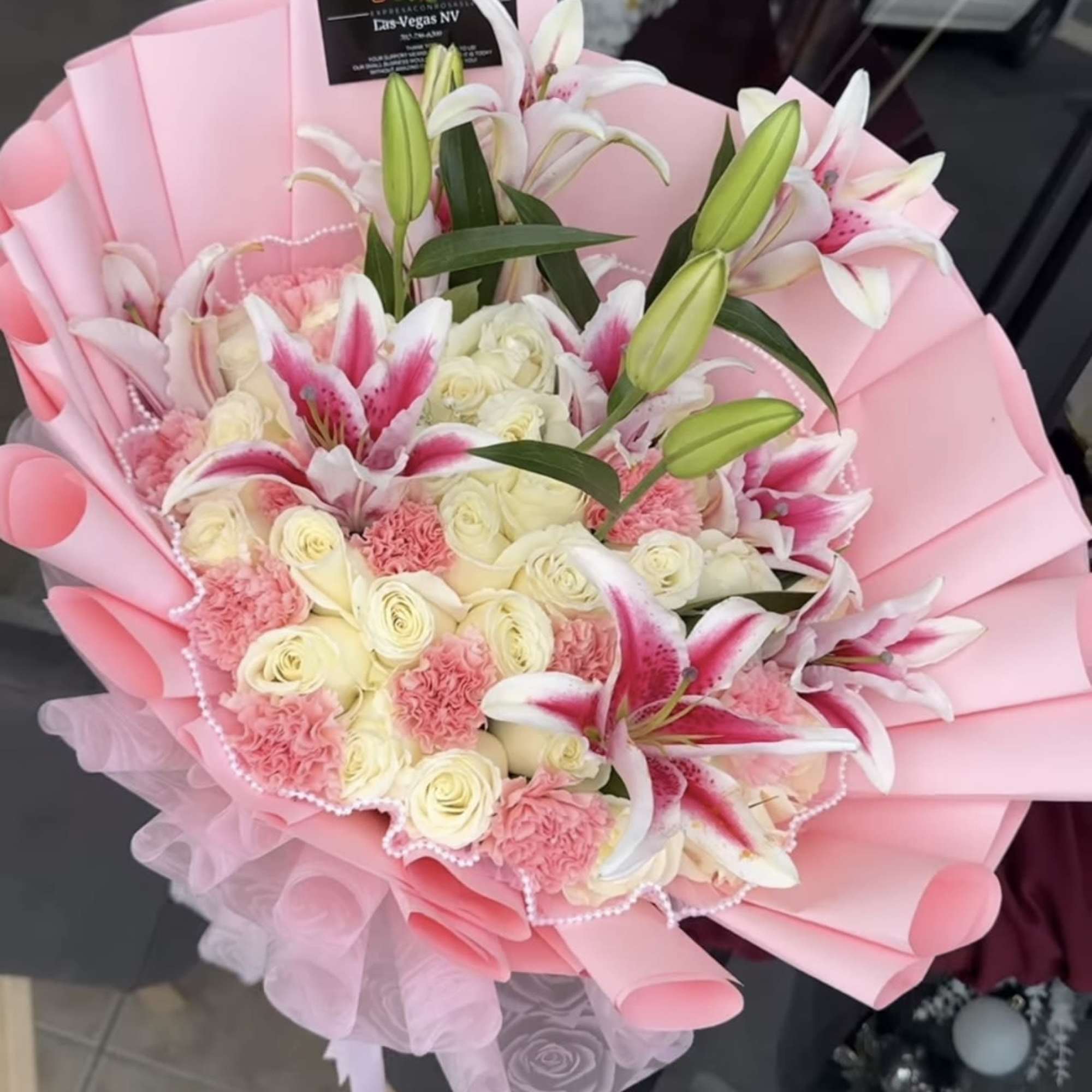 roses carnations and lilies

If you want to request a color wrapping of