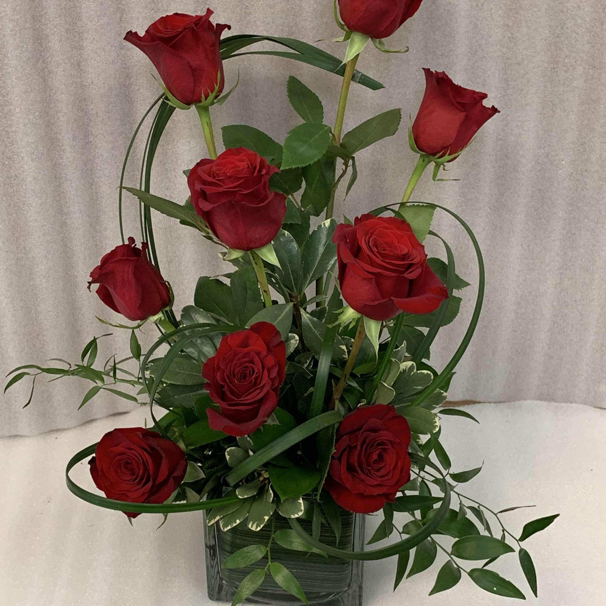 6 red roses that make a big show. You don't need a