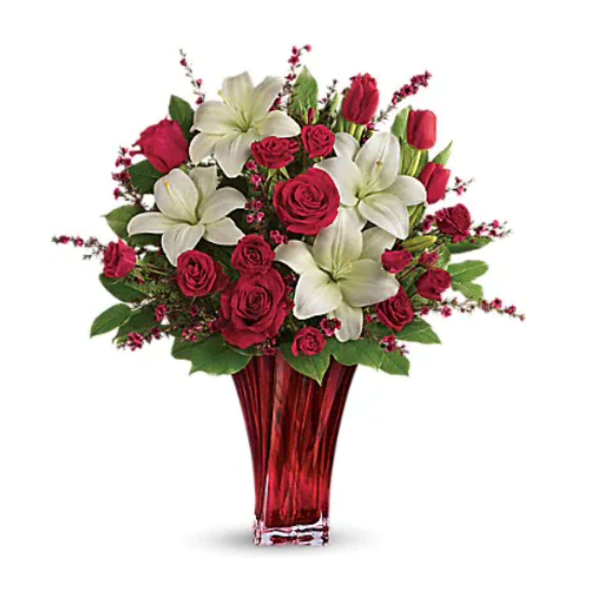 "Classic romance is this radiant bouquet of red roses, crimson tulips and