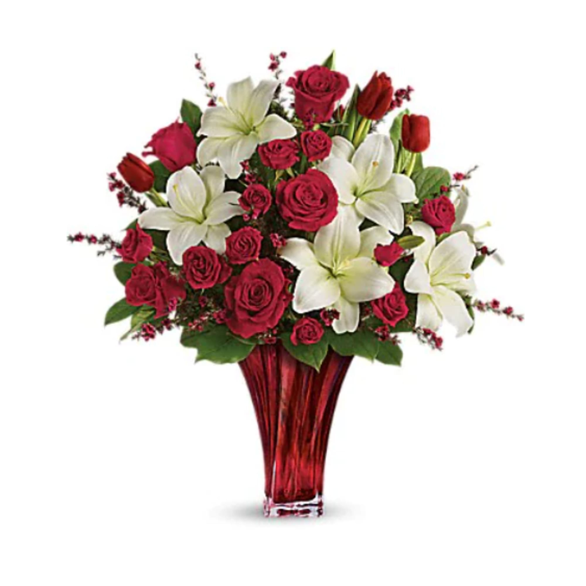 "Classic romance is this radiant bouquet of red roses, crimson tulips and
